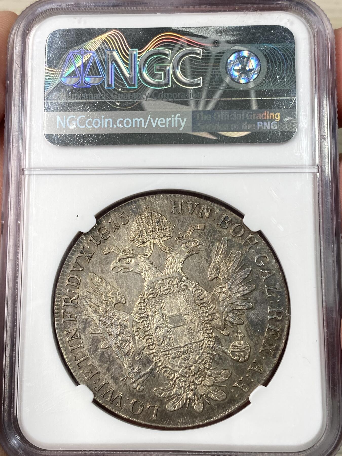 万国钱币拍卖第063期 NGC MS61 1815年奥地利帝国弗朗茨一世双头鹰大泰勒 熟美欧陆酱五彩包浆环绕打制极佳收藏级品质