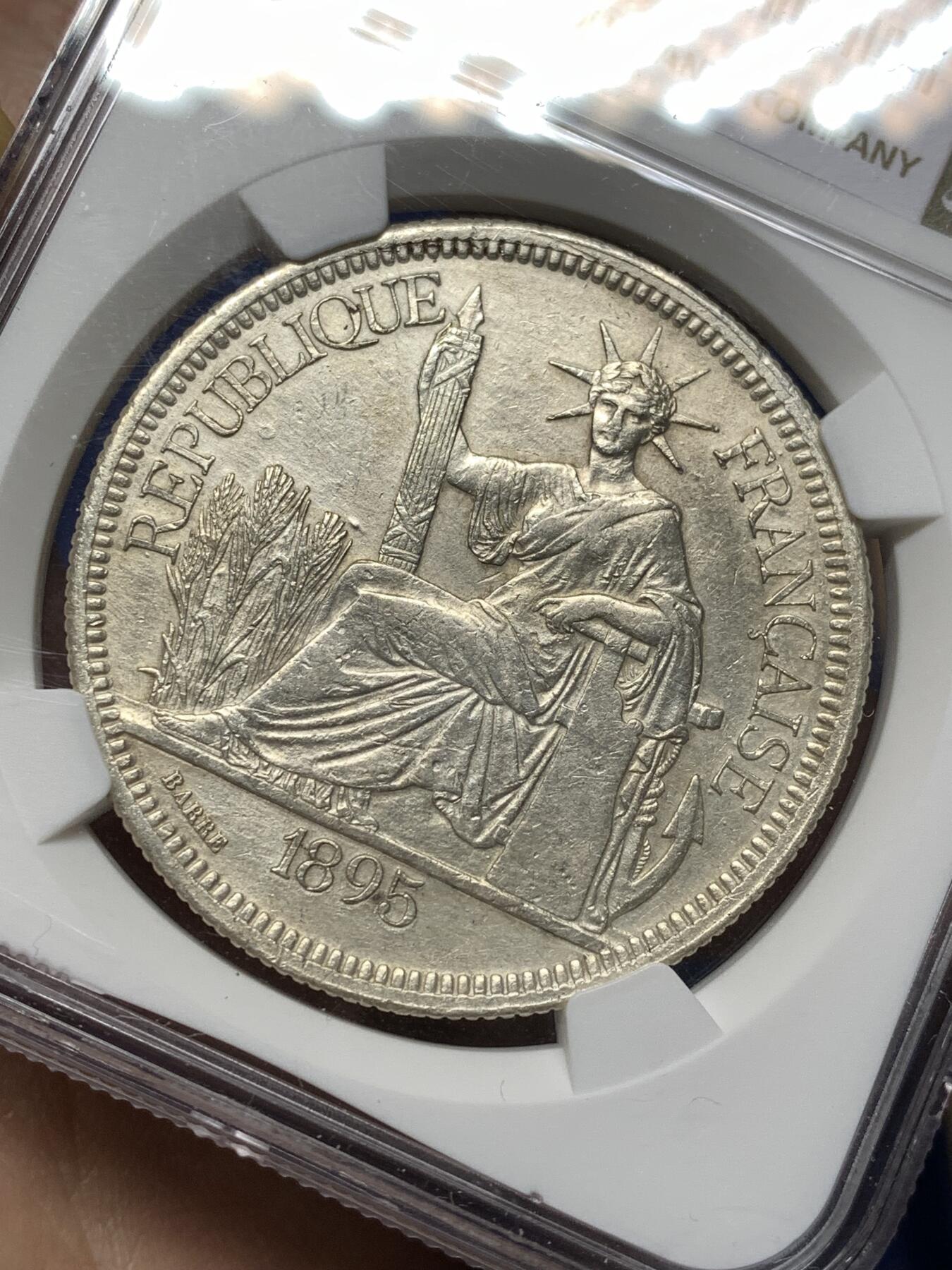 《竞宝斋》第474场 周日，周一 2场连拍 （全场包邮）欢迎送拍 NGC AUD 法属印支1895A坐洋1皮亚斯特银币 加重版