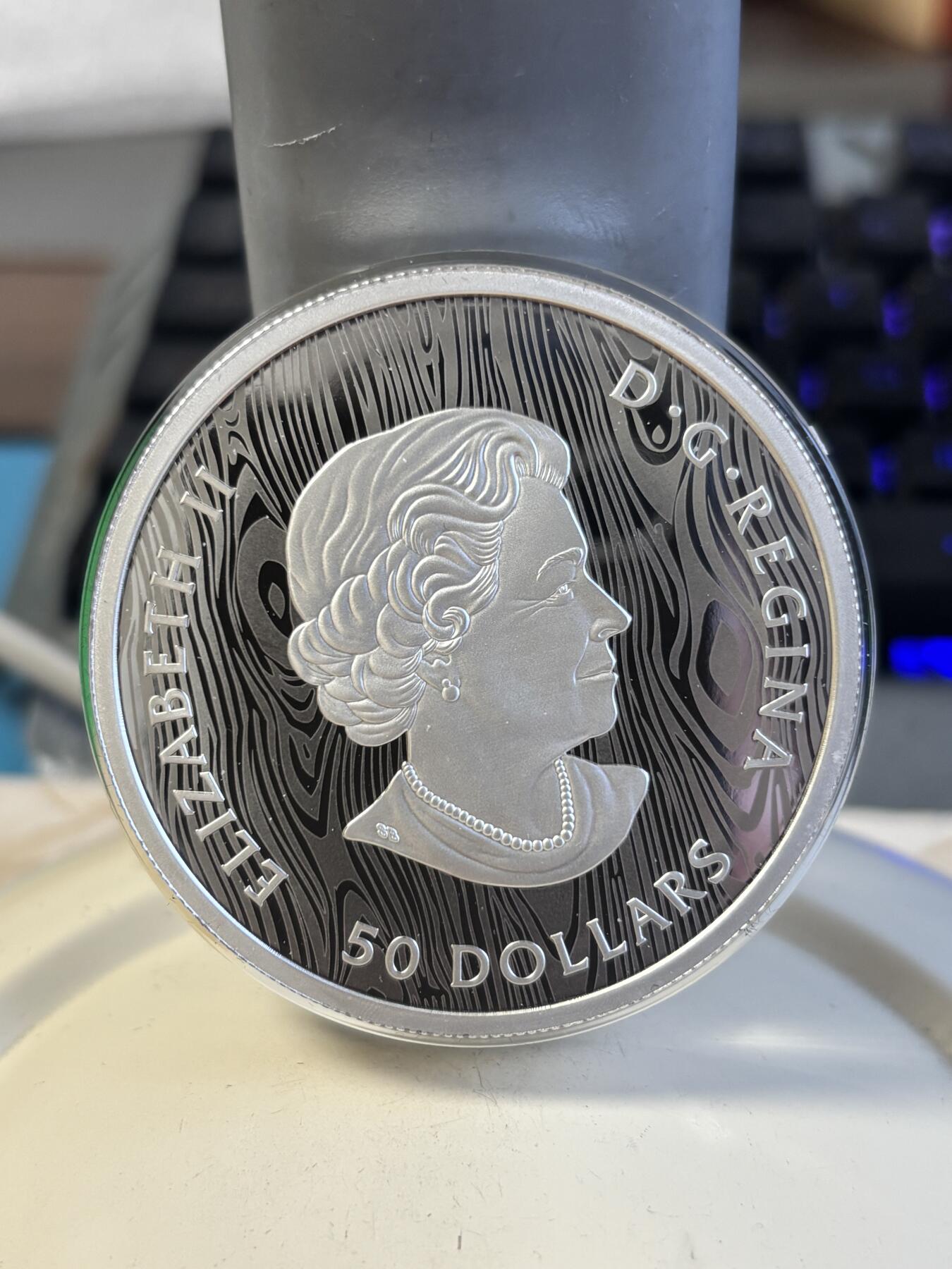 第195期拍卖 加拿大2021年美洲狮多层雕刻立体镂空105.6克银币，9999银，105.6克，发行1500枚