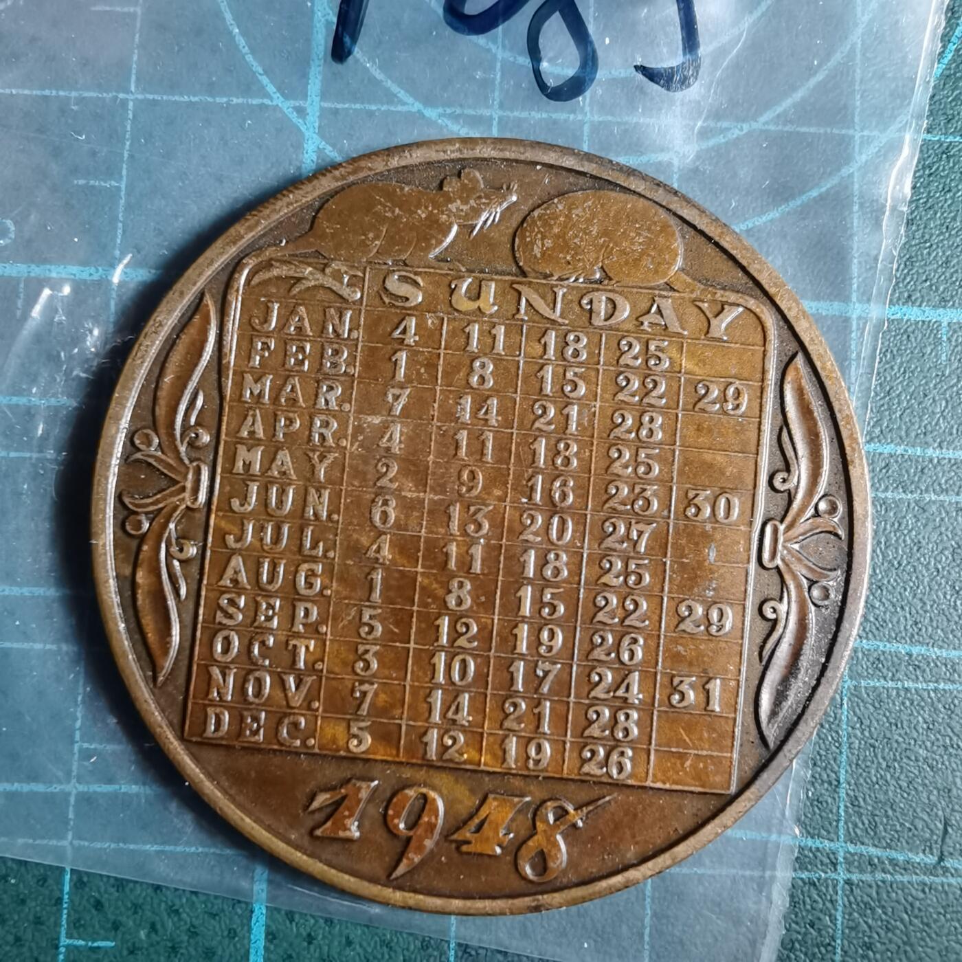 沼泽如烟--第1033场 1948年纪念章带日历