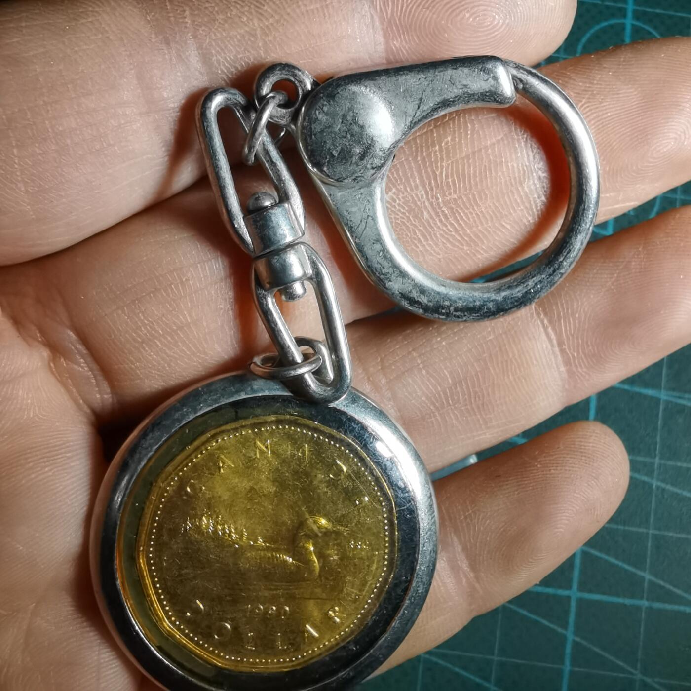 沼泽如烟--第1033场 加拿大一元吊坠