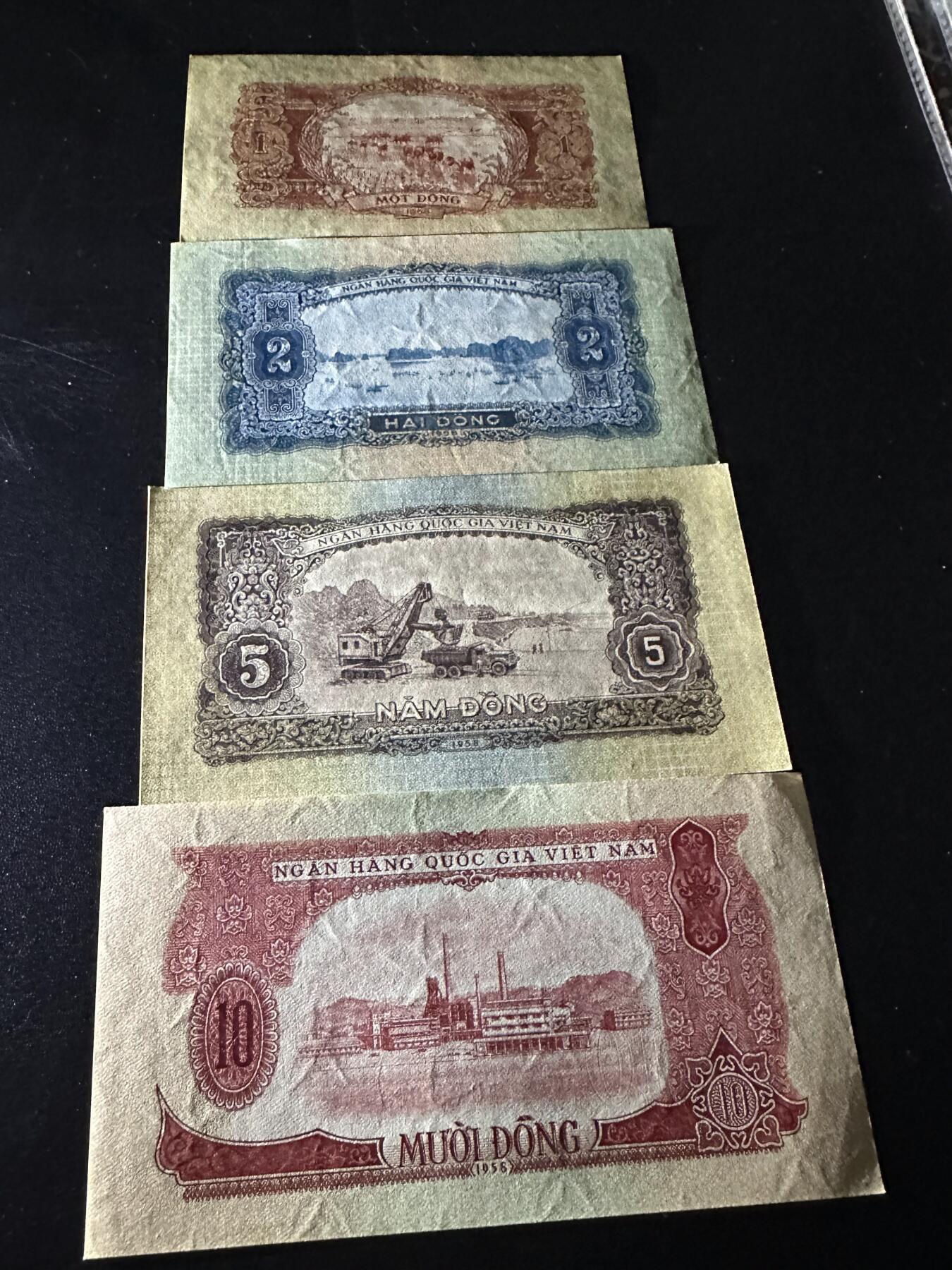 《外钞收藏家》第六百二十期（畅拍场）（长期征集拍品、欢迎藏友们联系合作） 越南1-10盾 四张一起 全新 但角不绝 尾557