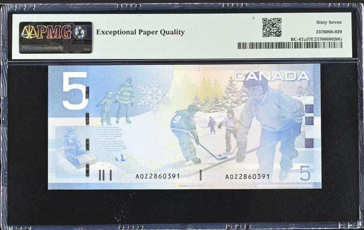 【礼羽收藏】🌏世界钱币拍卖第130期 2006年加拿大旅版5元，PMG67高分亚军分，全息条版首发年a版号码无47