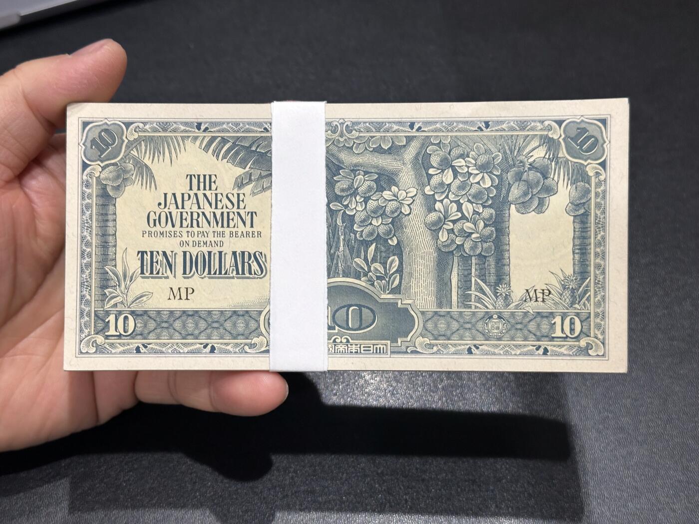 《外钞收藏家》第六百二十期（畅拍场）（长期征集拍品、欢迎藏友们联系合作） 日占马来亚10元 100张一起 全新