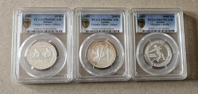 【币将精彩】世界钱币拍卖（2026-4-1） - 多国联合发行2004年雅典奥运纪念银币一组PCGS 有氧化 全套三枚，赞比亚，马拉维和乌干达联合发行，每枚20克，发行量500套。
