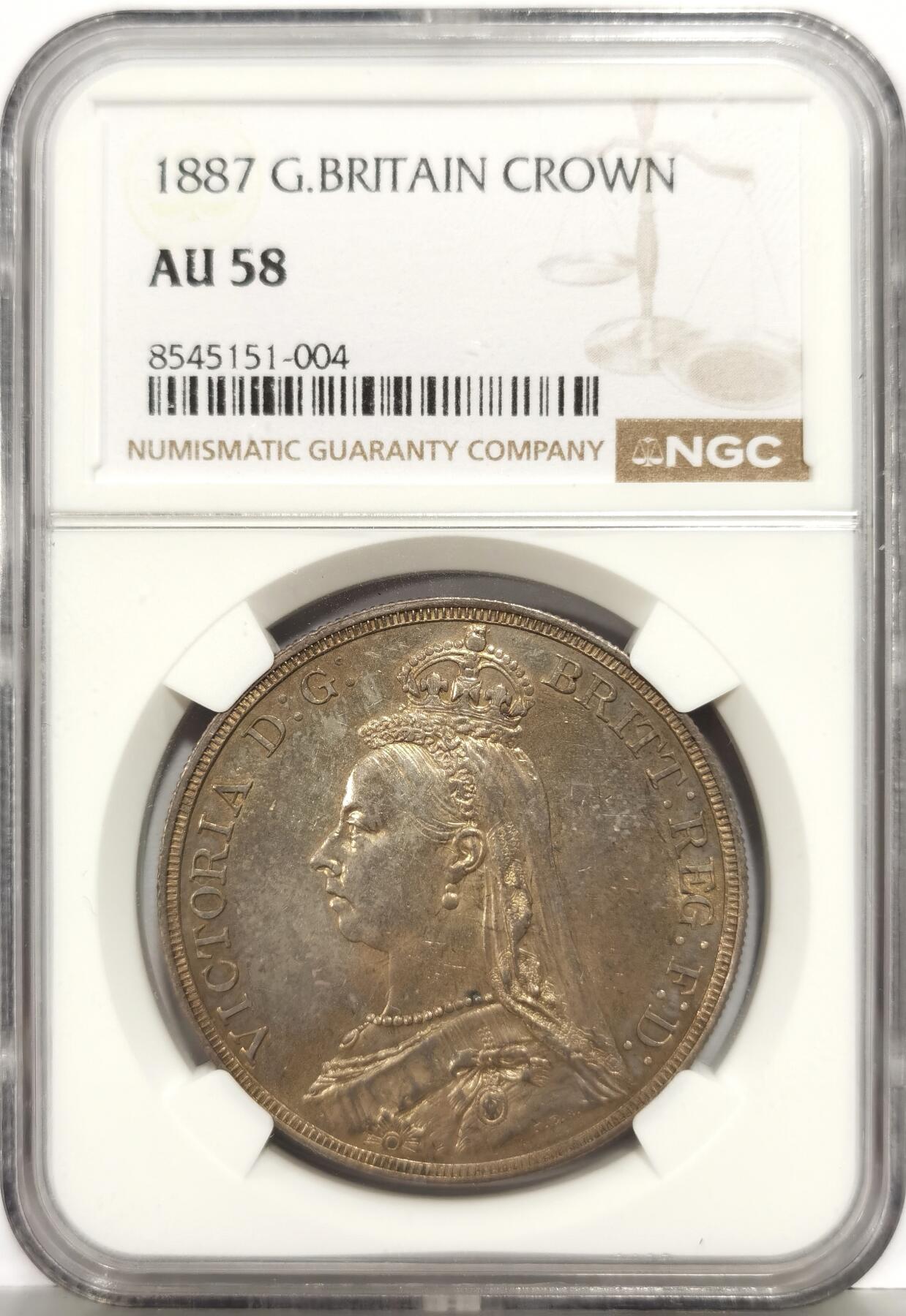 博洋堂“芳菲春韵”3月精品大拍专场暨第166期（全场包邮） NGC AU58 英国1887年维多利亚女王高冠马剑1克朗银币，原汁原味老包浆，包浆醇厚浓郁，细节清晰，味道绝，人物，头像，图案栩栩如生，极美黄油彩包浆，味道币味道足，状态和品质绝对不输MS级。