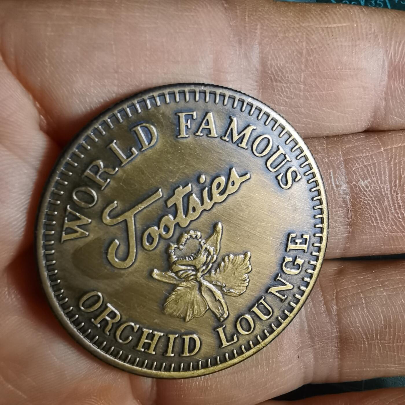 沼泽如烟--第1033场 美国田纳西州纳什维尔Tootsie's Orchid Lounge（图茨兰花酒廊）主题纪念币，并非流通货币，属于旅游纪念章
