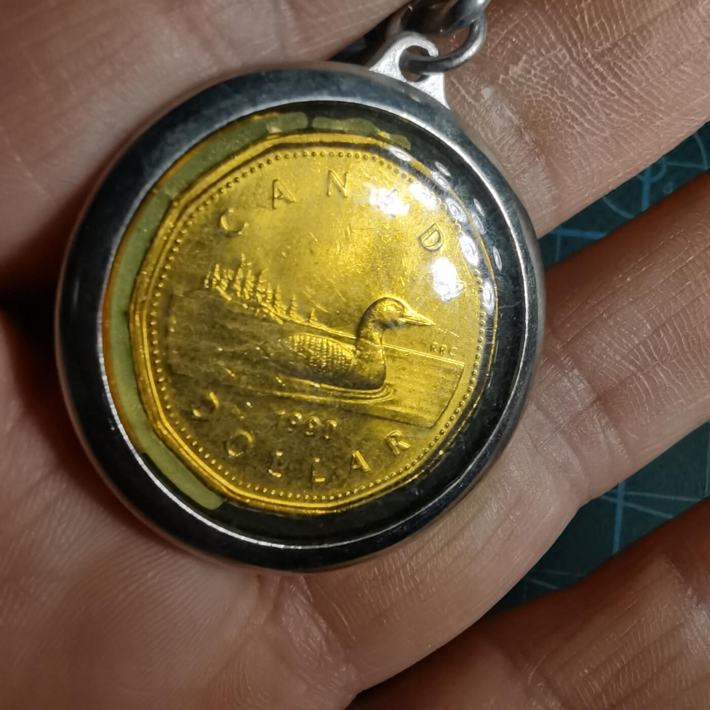 沼泽如烟--第1033场 加拿大一元吊坠