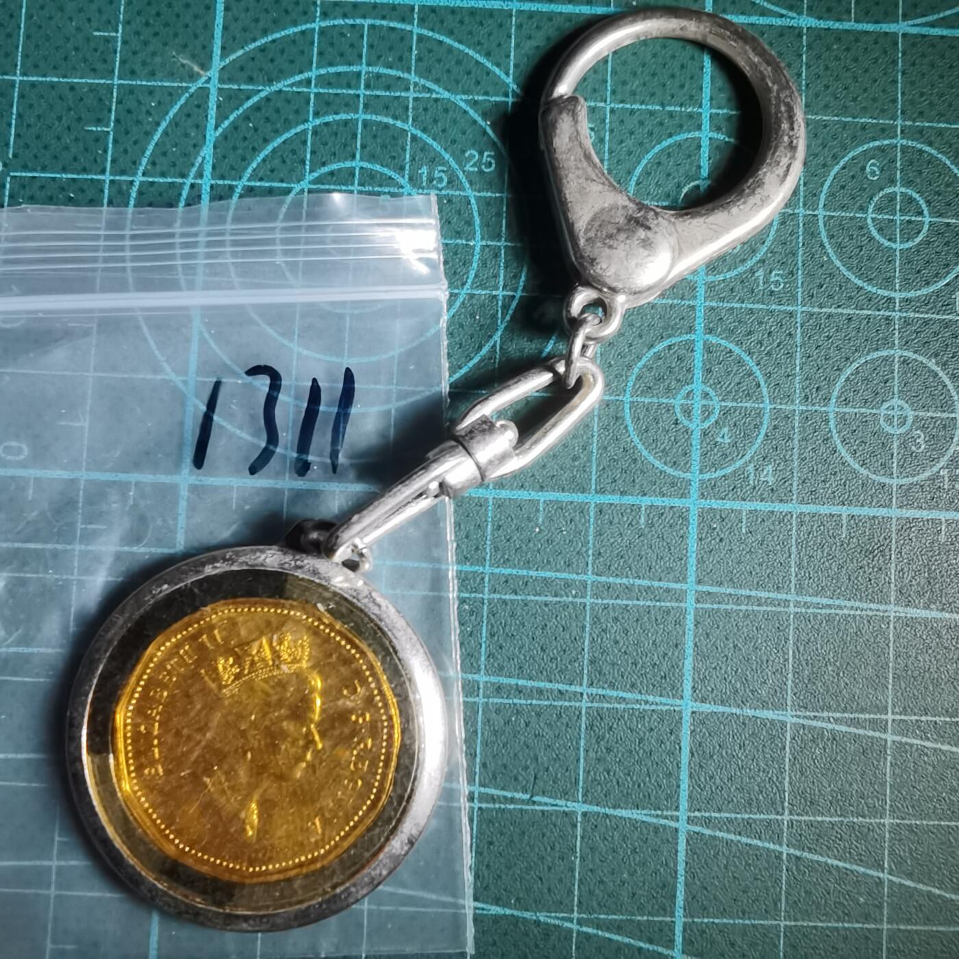 沼泽如烟--第1033场 加拿大一元吊坠