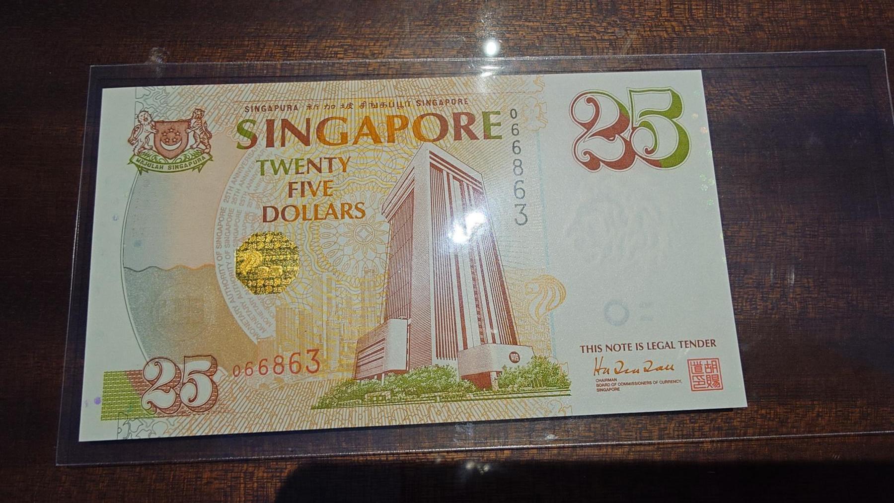 世界钱币～微拍第241期暨2026年第22期  部分新货（群里挑剩）陆续上架 新加坡金管局25周年纪念钞 全新绝品无斑原装册 全程无47尾号863