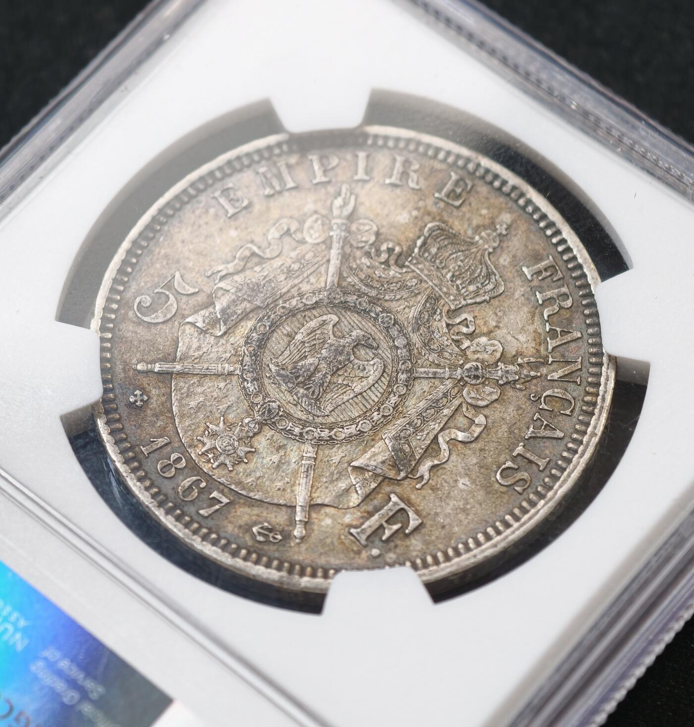 甄臻铺-世界币章拍卖（第56期），送拍享返佣金等优惠多多 NGC-AU55 法国1867年拿破仑三世纹章5法郎大银币 原味酱彩十分难得