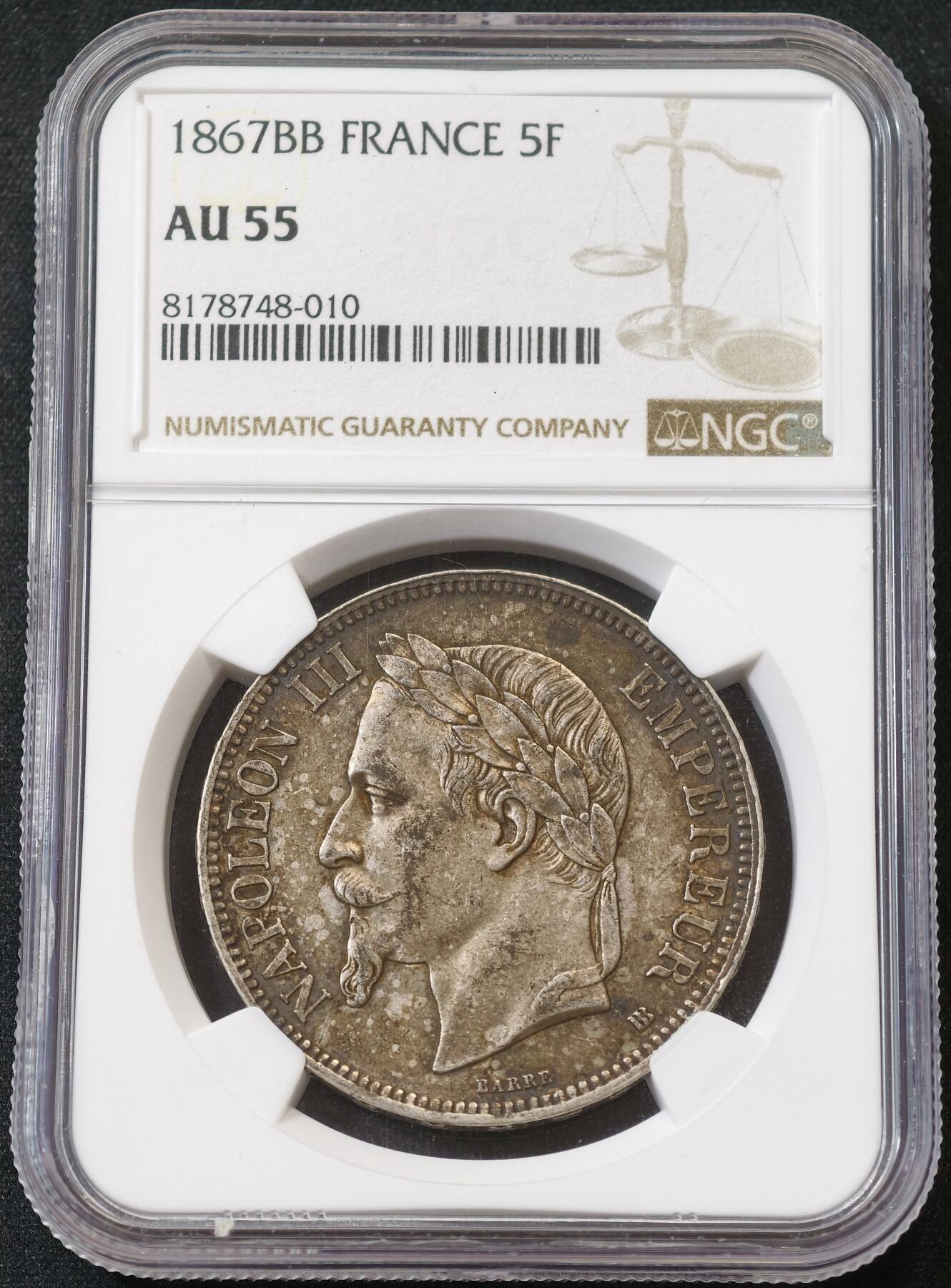 甄臻铺-世界币章拍卖（第56期），送拍享返佣金等优惠多多 NGC-AU55 法国1867年拿破仑三世纹章5法郎大银币 原味酱彩十分难得