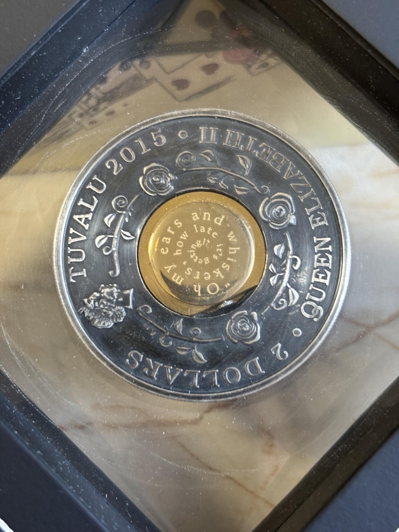 第195期拍卖 图瓦卢2015爱丽丝诞生150周年镶嵌实体时钟纪念银币，999银，发行2500枚