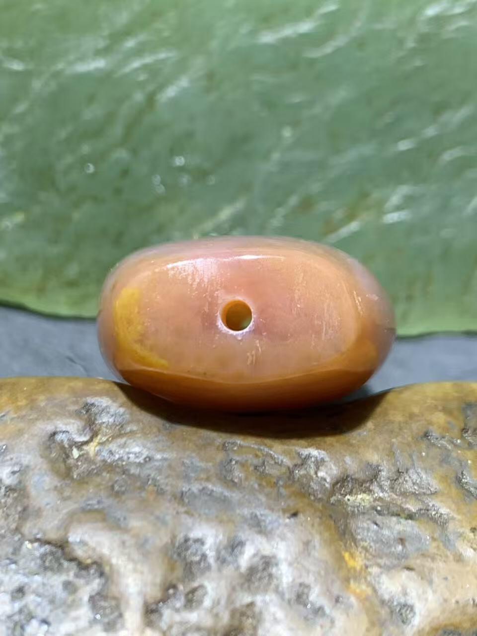 精美冰粉冻料鱼籽纹战国红玛瑙随形背云，勒子一颗！