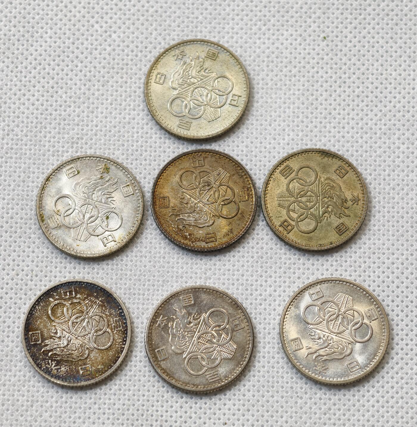 甄臻铺-世界币章拍卖（第56期），送拍享返佣金等优惠多多 日本 1964年 百円银币 7枚一组 批量中挑出的好品