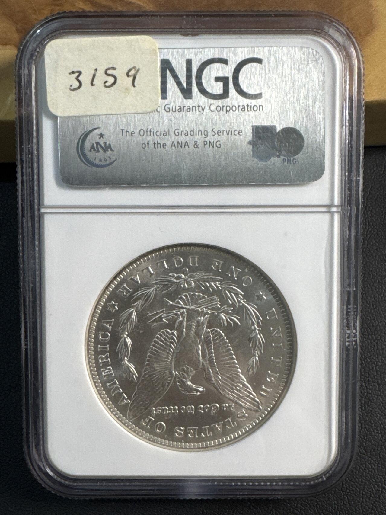 ❤️【币观天下】❤️ 第346期钱币拍卖场- 2026.3.27周五晚上6点半场 长期征集拍品  美国1884-O摩根银币Ag 900·26.73gNGC MS64·老盒严评·两面爆霜