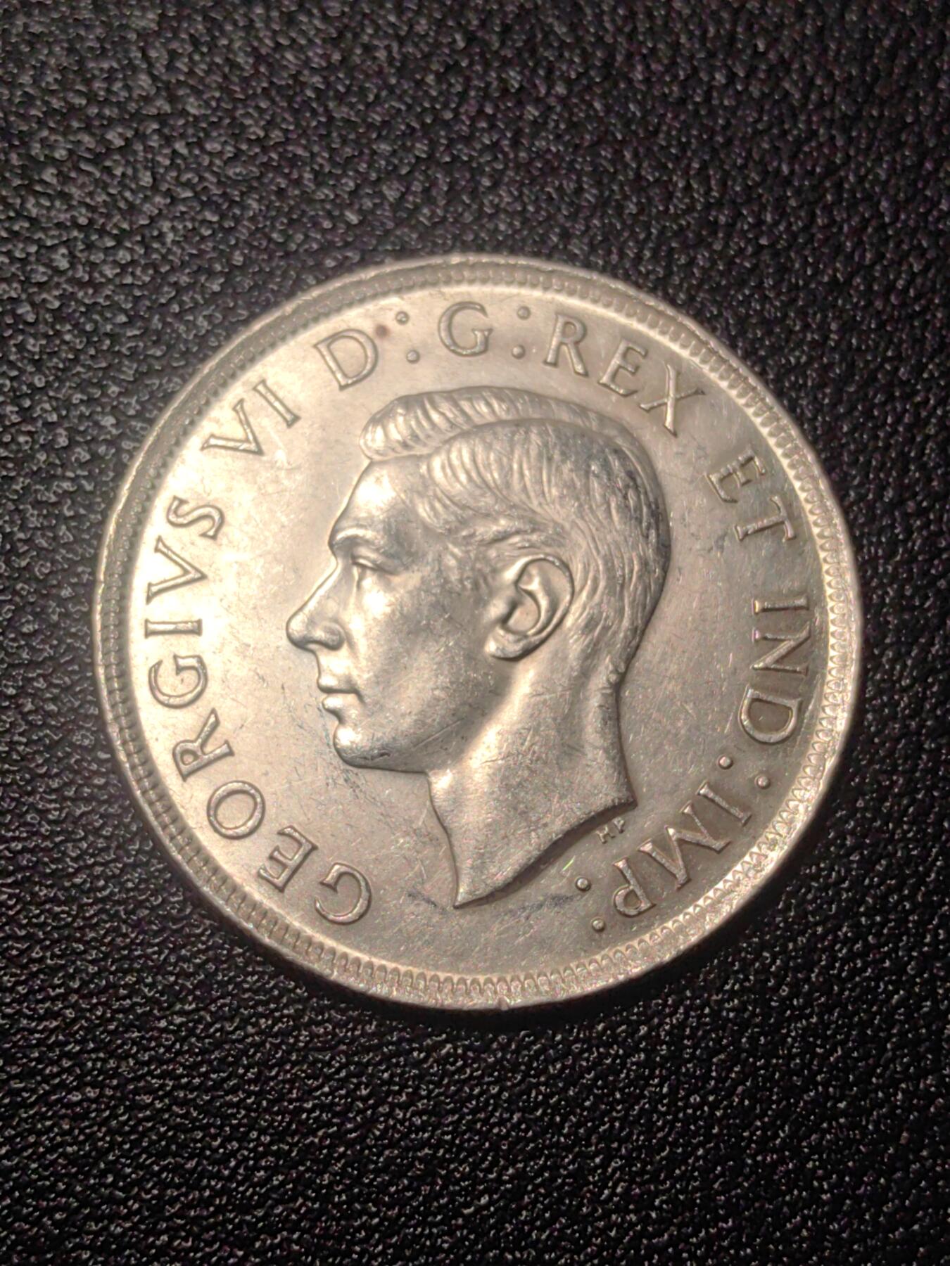 靖甫拍卖第七场 加拿大1939一元大银币