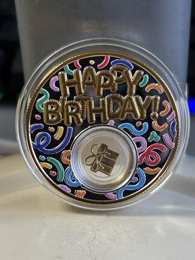 第195期拍卖 - 喀麦隆2024年生日快乐中空镶嵌镀金银片彩色银币，999银，14.14克，发行999枚