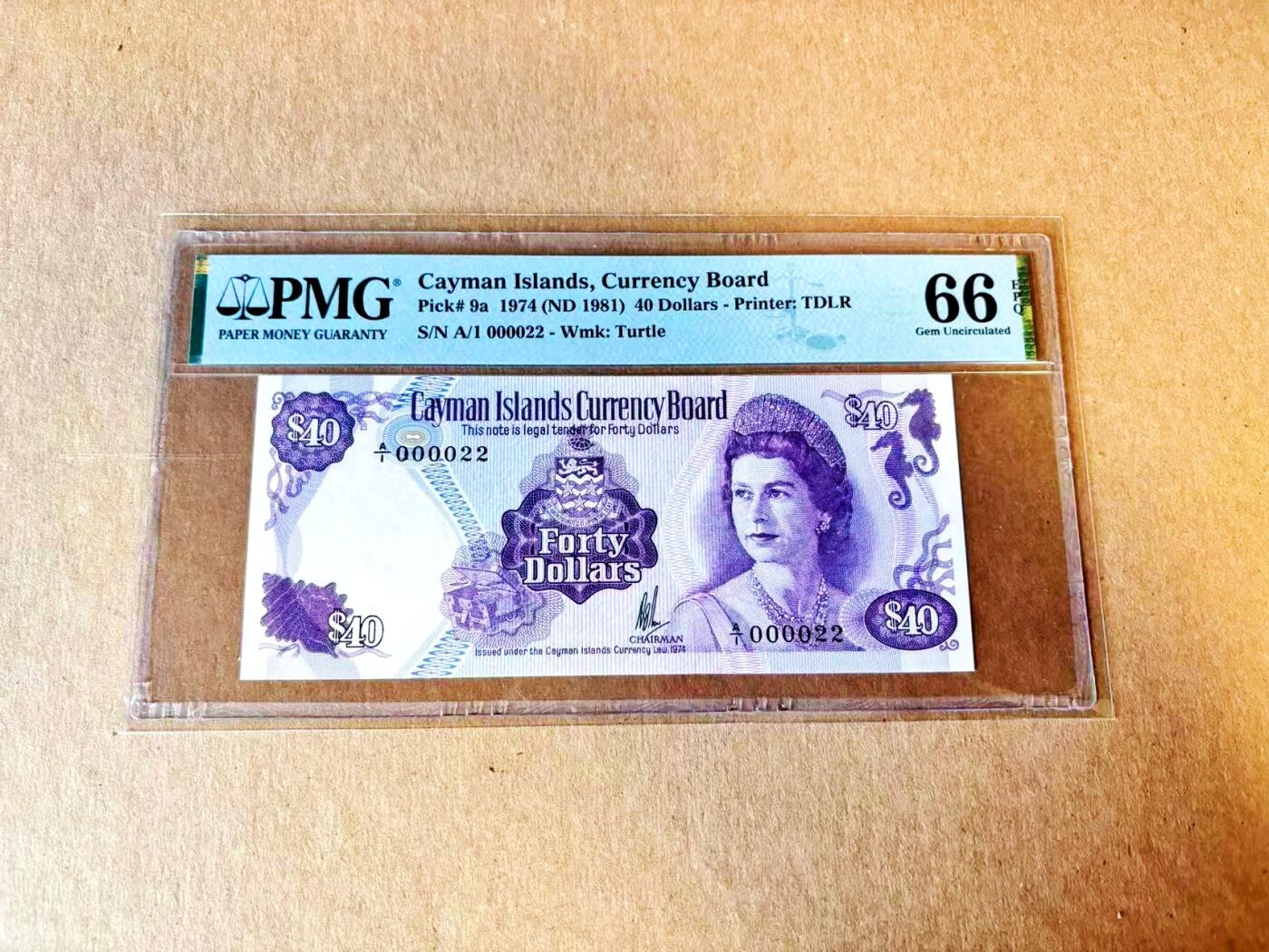 【Blue Auction】世界纸币精拍第799期——18级TOP拍卖/信誉/品质/专业/高效💫 【A/1首发冠 22小号罕见】开曼群岛1981年40元 女王 背面大场景 PMG66EPQ