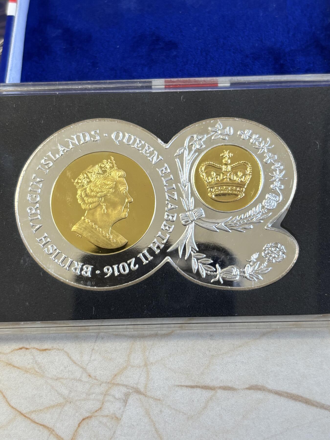 第195期拍卖 维尔京2016年英女王90大寿90数字形镀金2盎司银币，999银，发行3000枚