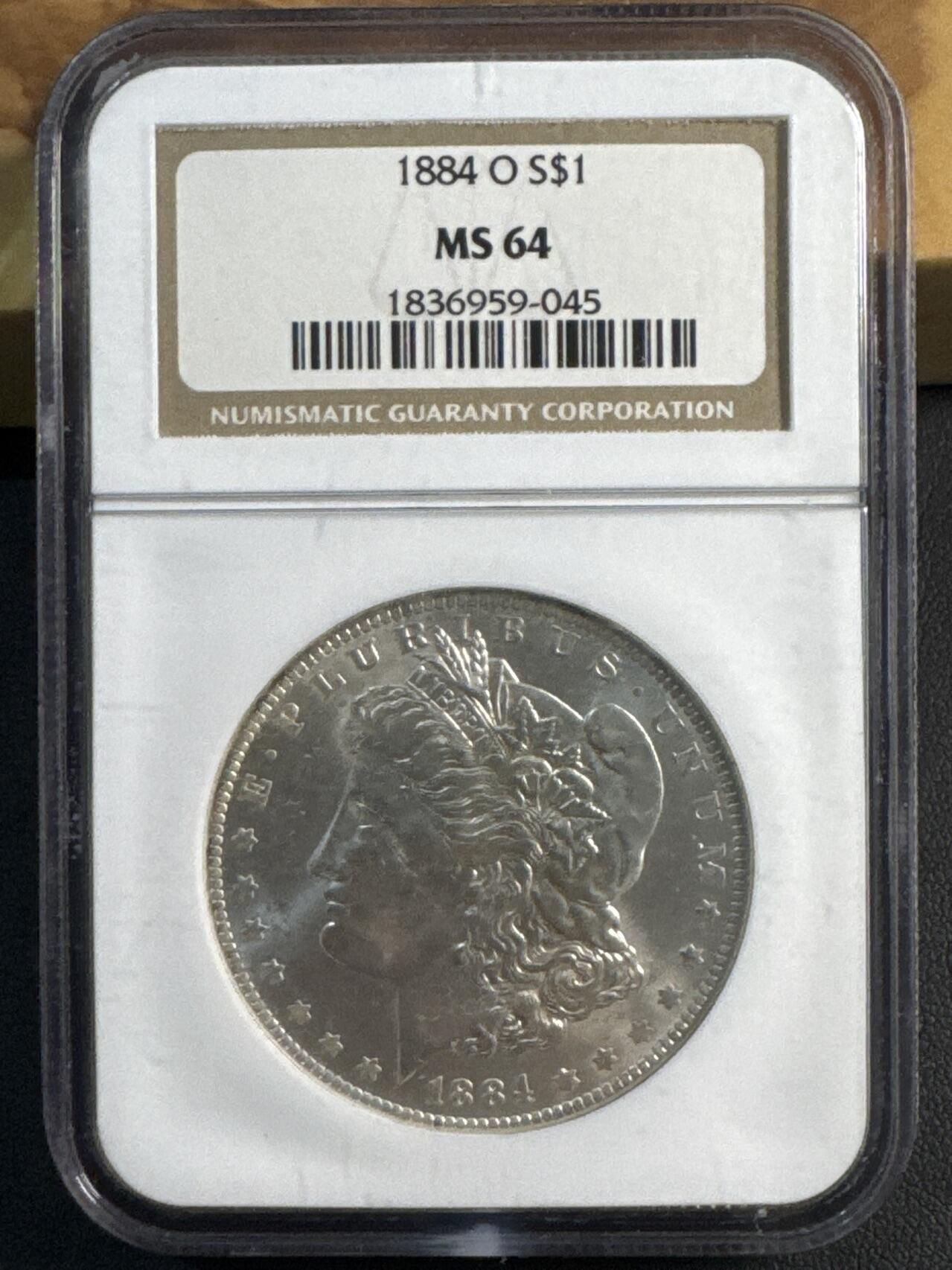 ❤️【币观天下】❤️ 第346期钱币拍卖场- 2026.3.27周五晚上6点半场 长期征集拍品  美国1884-O摩根银币Ag 900·26.73gNGC MS64·老盒严评·两面爆霜