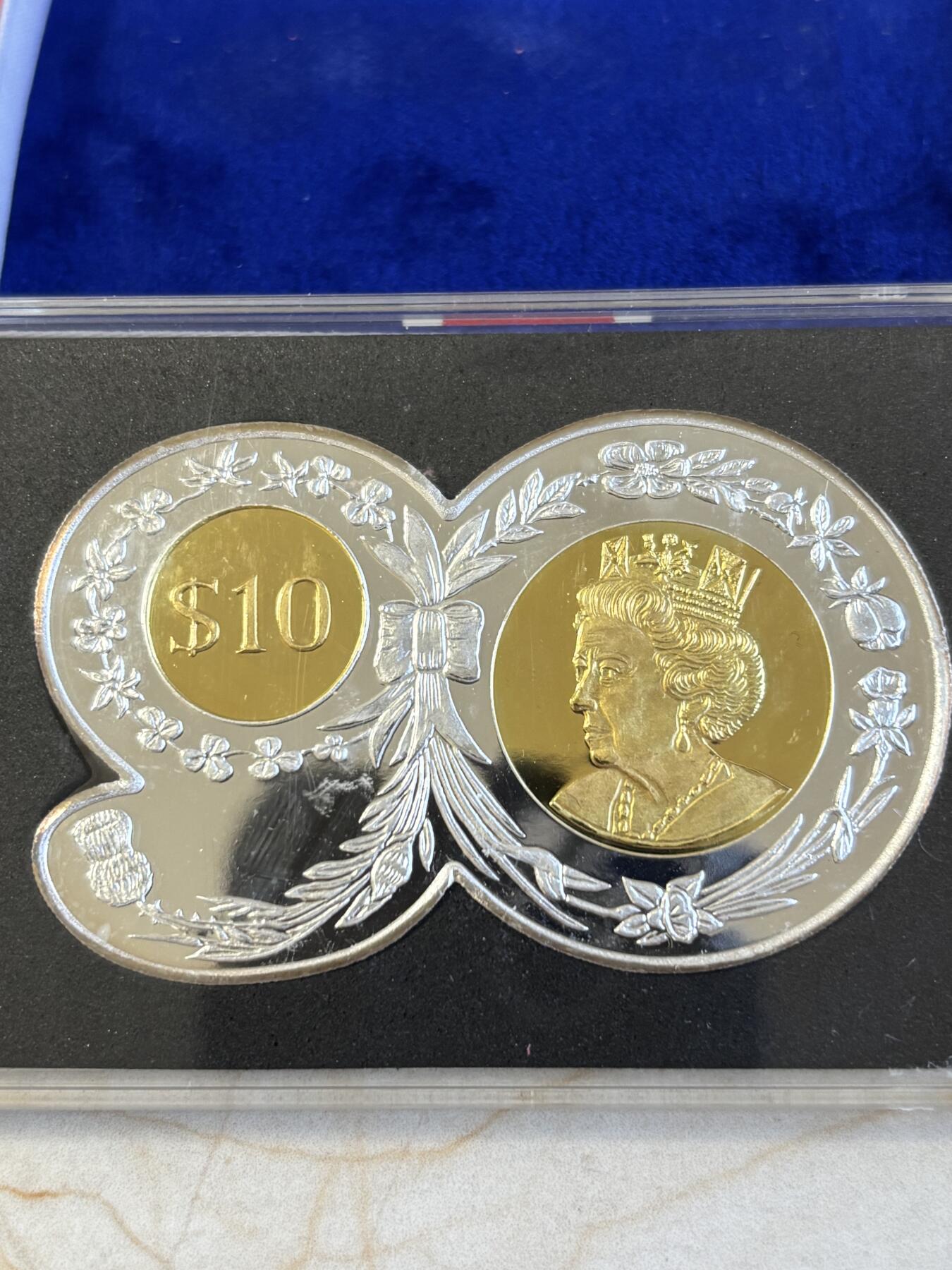 第195期拍卖 维尔京2016年英女王90大寿90数字形镀金2盎司银币，999银，发行3000枚