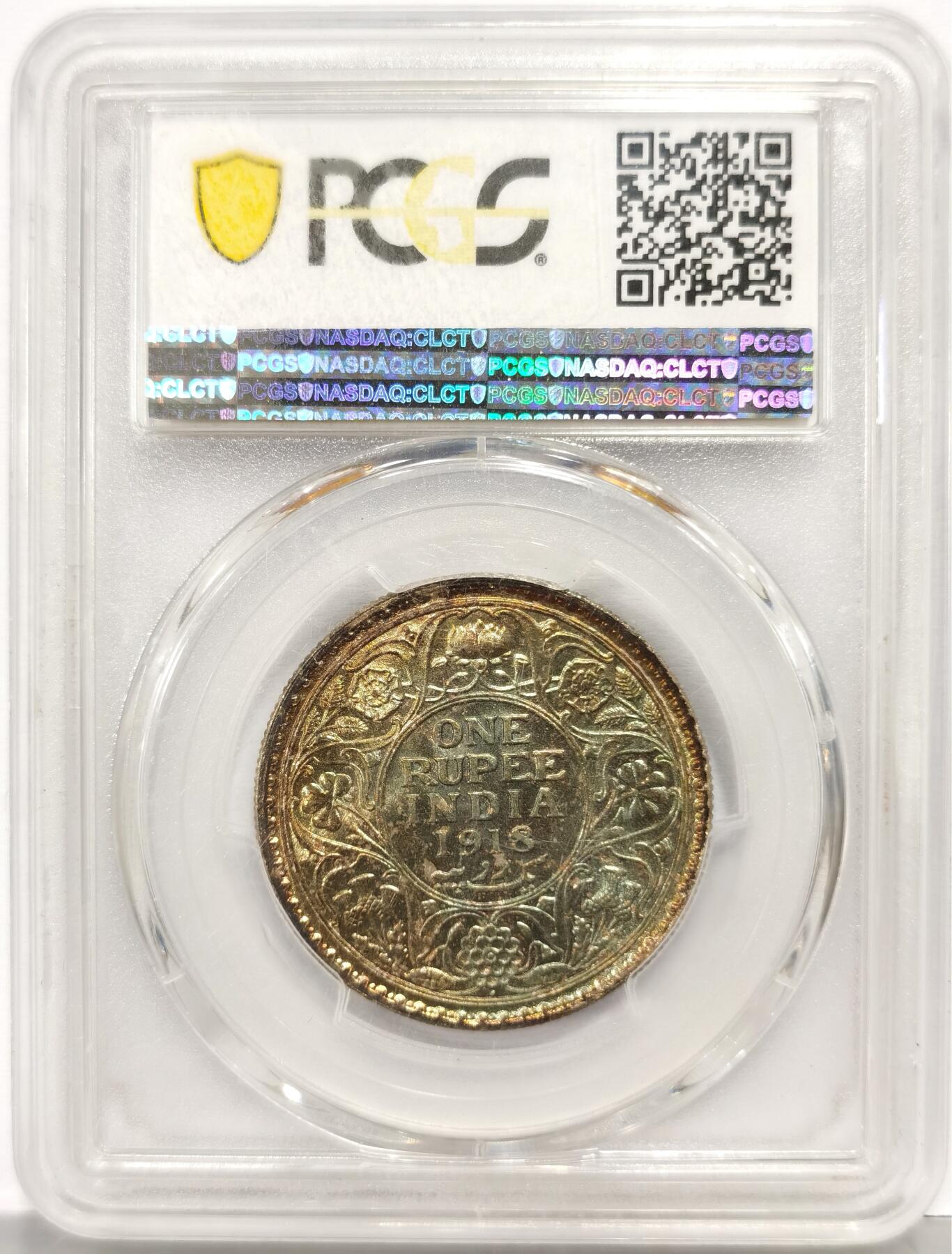 博洋堂“芳菲春韵”3月精品大拍专场暨第166期（全场包邮） PCGS MS65 英属印度1918年B版乔五1卢比银币，打制深，包浆熟，正面五彩，似《灵魂战车》中恶灵骑士，背面金黄蓝色包浆均匀非常漂亮，乔五卢比上MS65分以上非常少，这枚为PCGS亚军分，上面仅2枚65+更高分，同分22年10月拍出4873元，相比之下，这枚彩更好，为收藏精品。