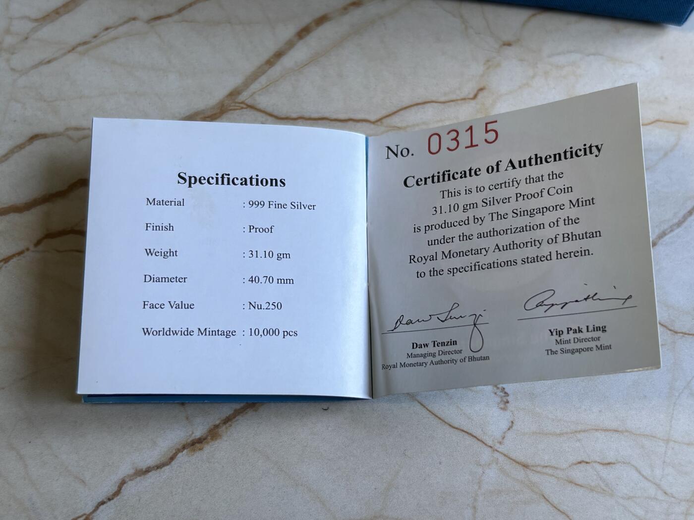 第195期拍卖 不丹2010年世界文化遗产佛精制彩色纪念银币，1盎司999银，发行量10000枚