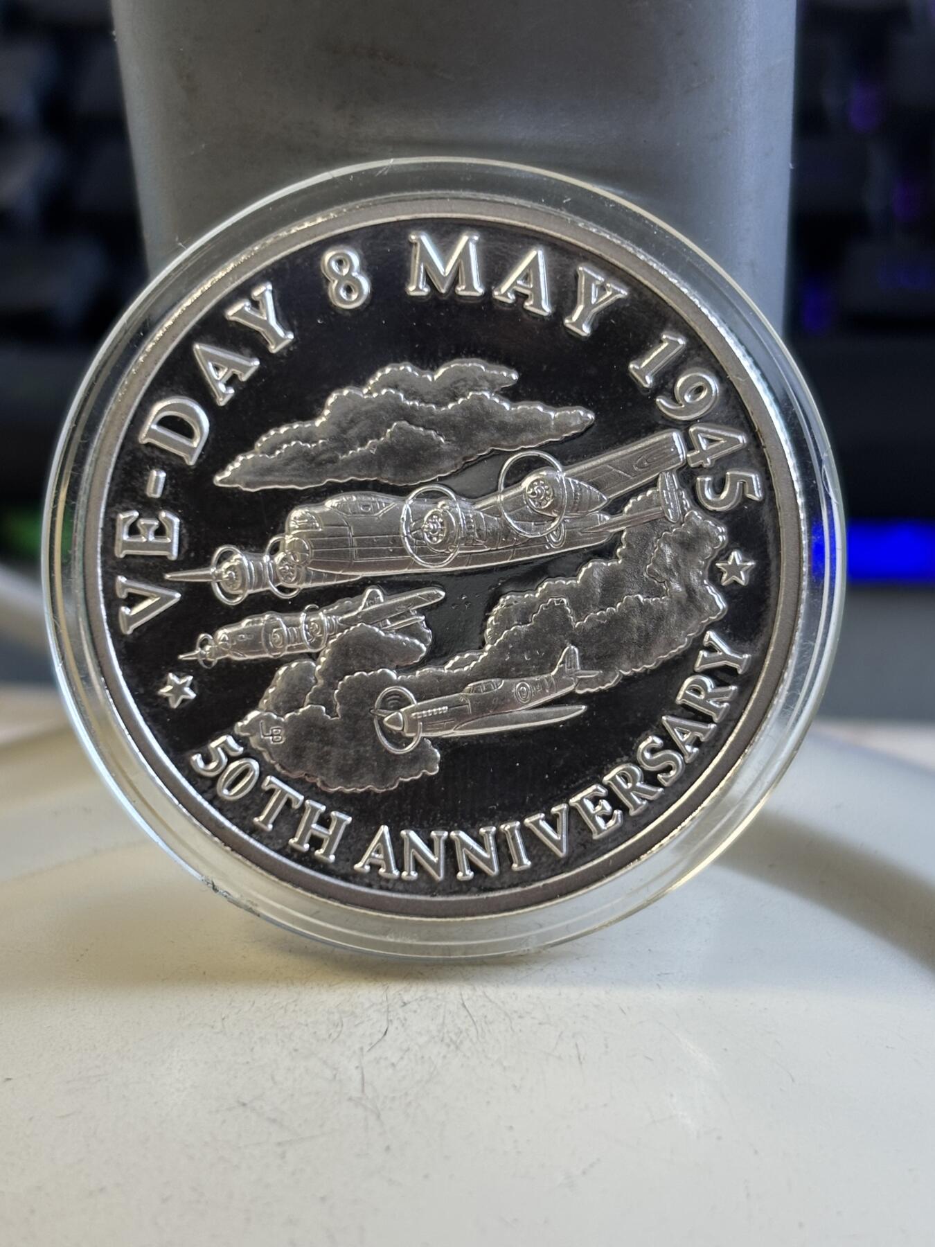 第195期拍卖 特克斯和凯科斯1995年战争结束50周年纪念银币，999银，1盎司