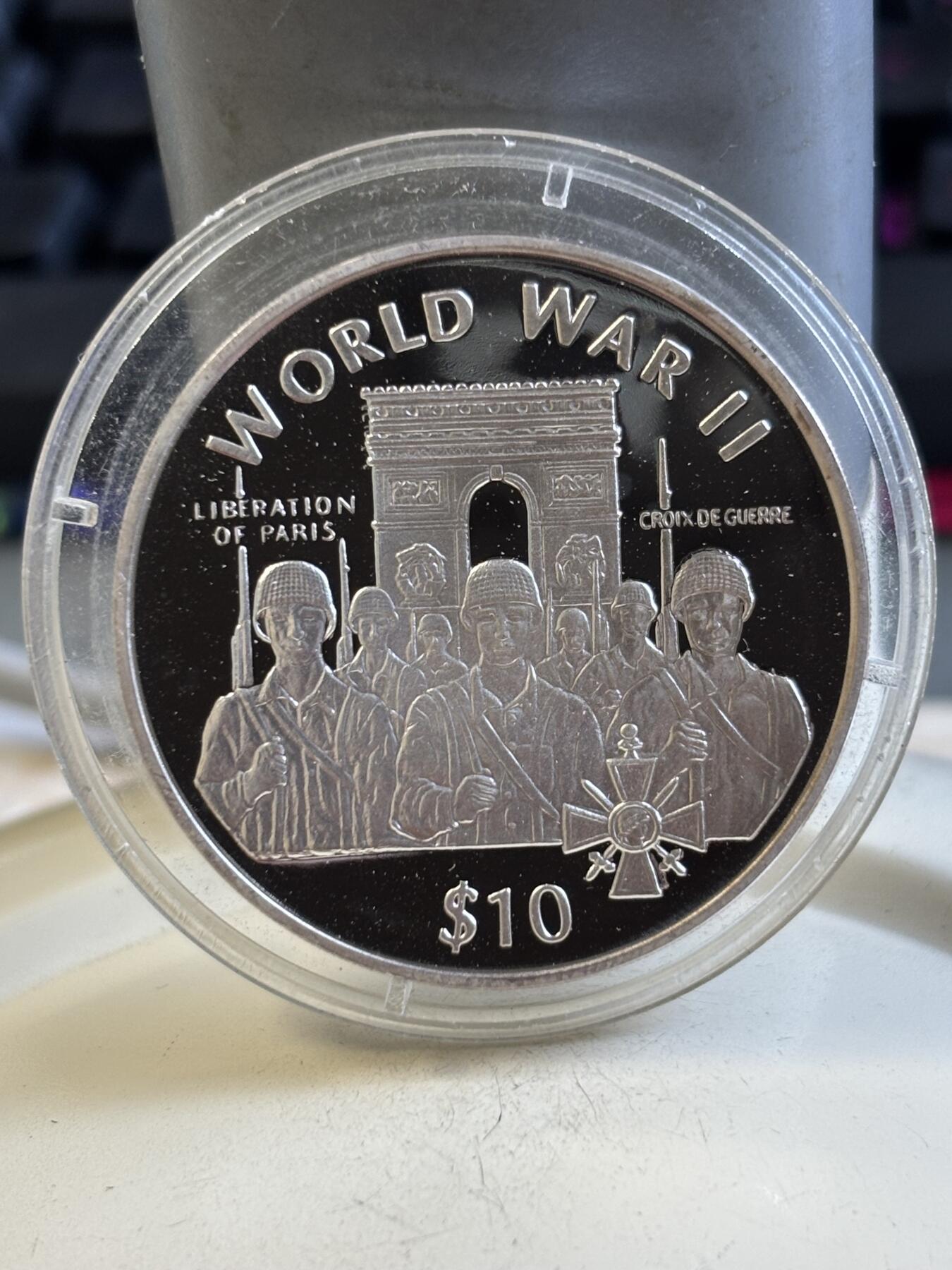 第195期拍卖 利比里亚1997年世界第二次大战纪念银币，925银，31克，有氧化点