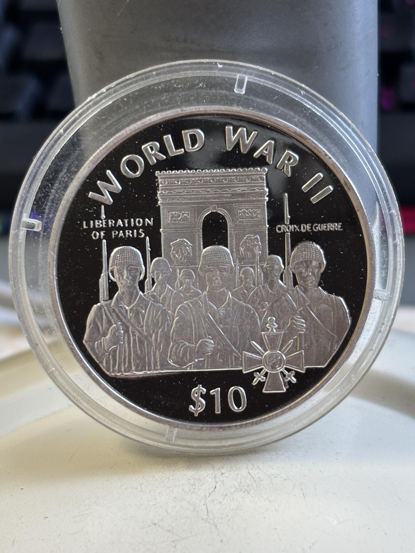 第195期拍卖 利比里亚1997年世界第二次大战纪念银币，925银，31克，有氧化点