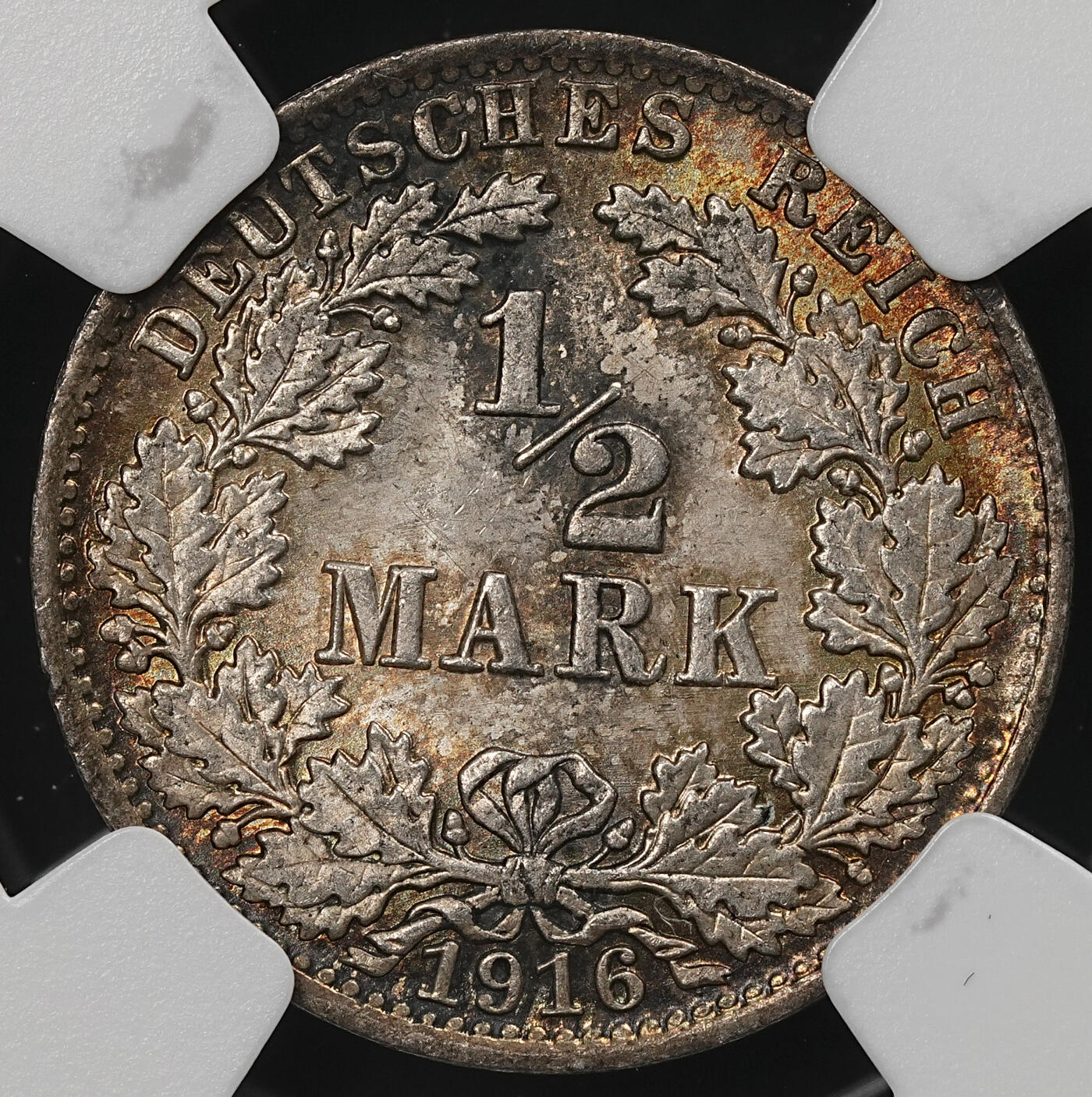 修遠堂世界钱币第109期 NGC MS65 1916年德国1/2马克银币 A厂铭，五彩