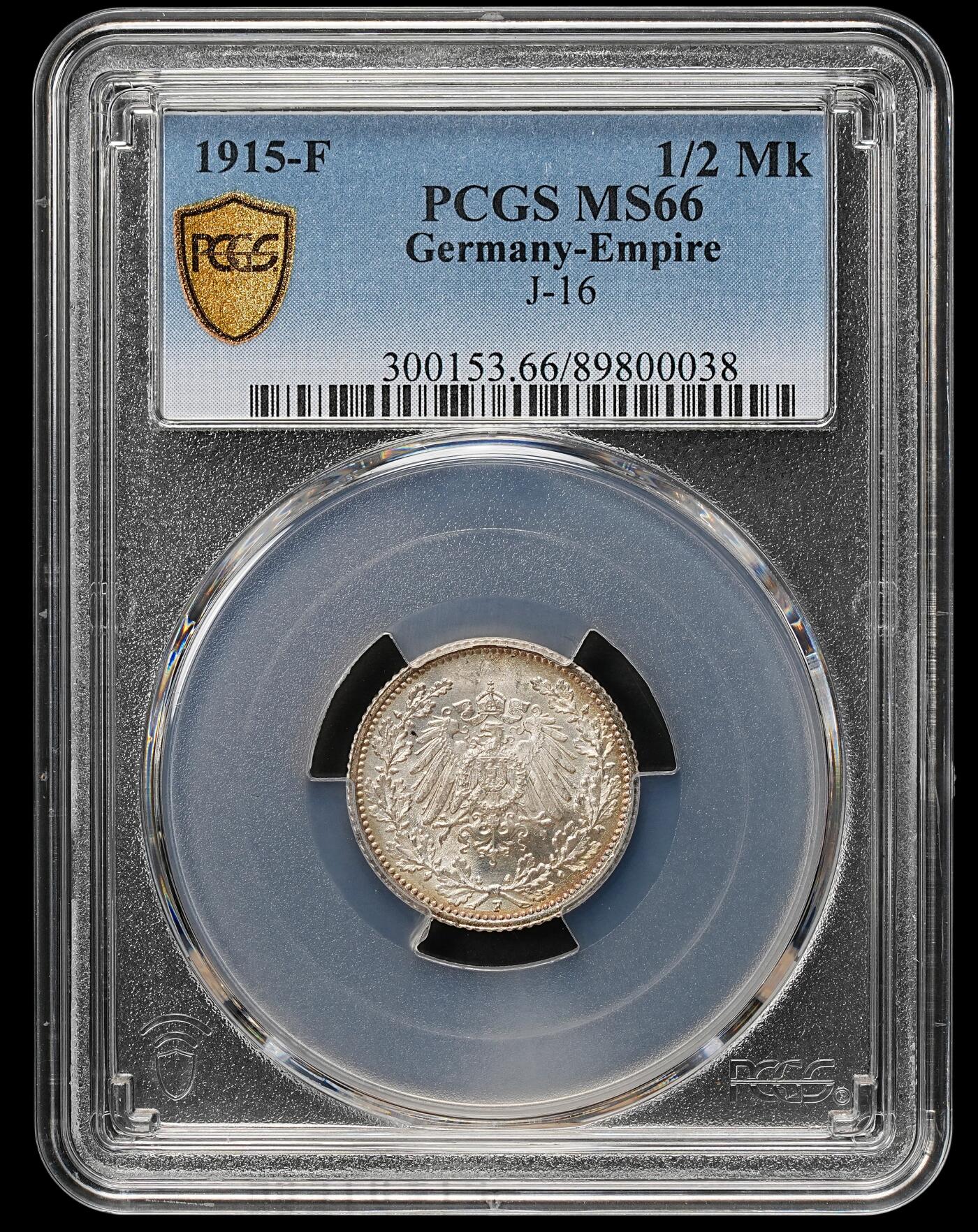 修遠堂世界钱币第109期 PCGS MS66 1915年德国1/2马克银币，F厂铭，同一原卷上一次送评级都是67-68，这次送惨被压分，这枚绝不止66的状态，环彩