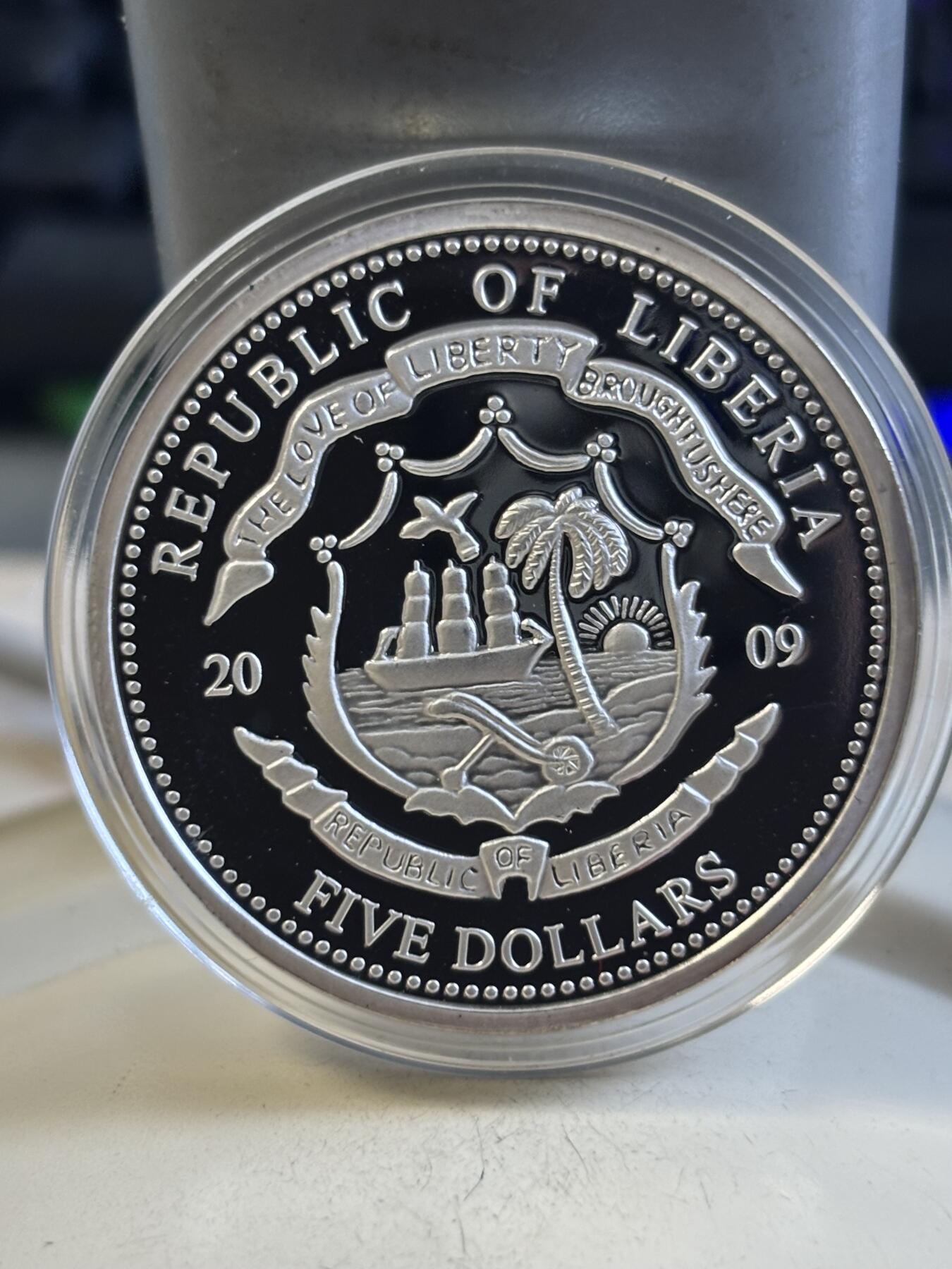 第195期拍卖 利比里亚2009年奥巴马彩色铜镍镀银纪念币，27克，塑料盒有条裂痕