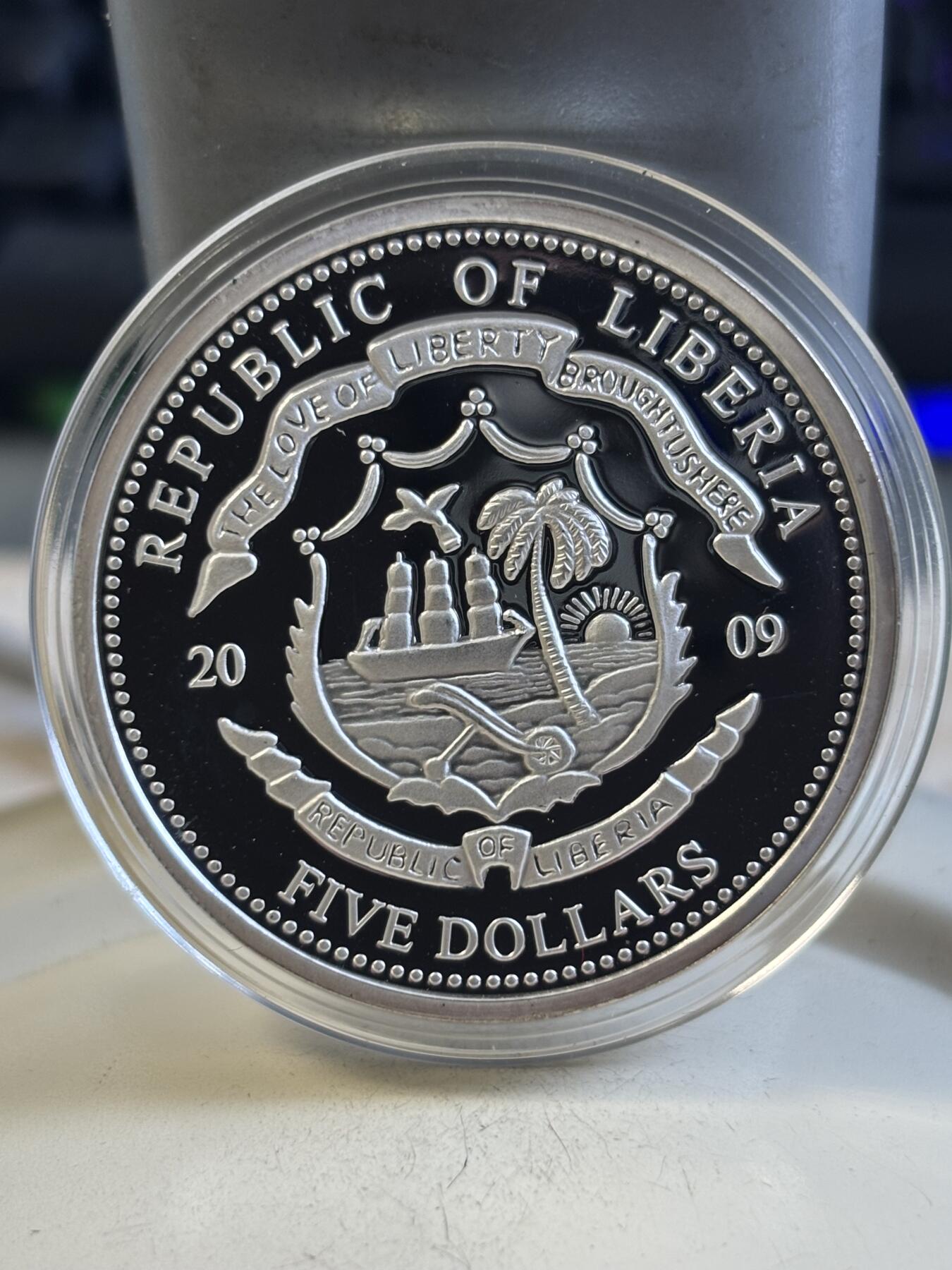 第195期拍卖 利比里亚2009年奥巴马彩色铜镍镀银纪念币，27克，塑料盒有条裂痕