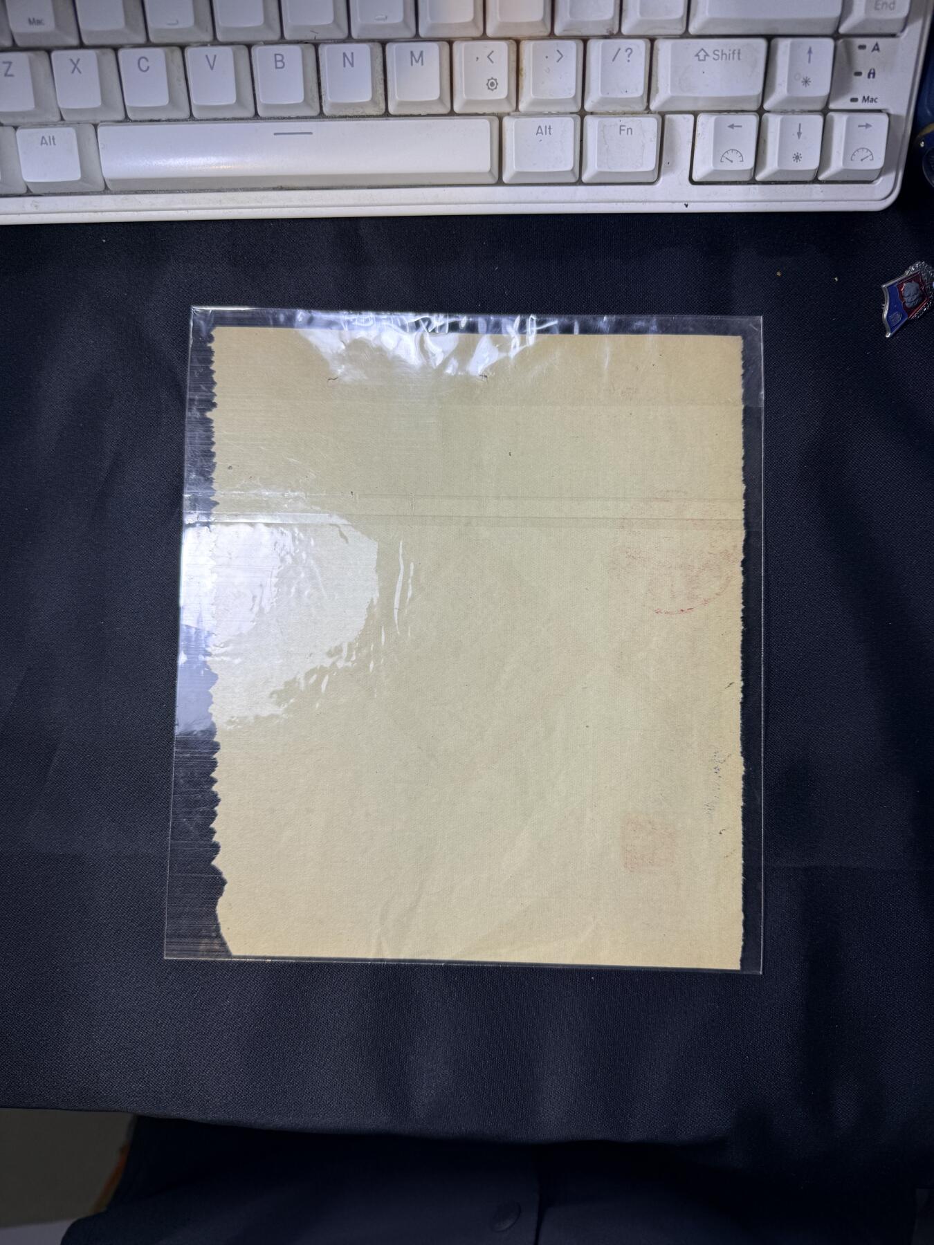 云宸嘉赏-勋臻文献佳藏优品精选场次（低佣 转发佣金红包） 解放初期新疆省时期人民政府财政厅税务局 临商税票 新天字第 712596 号  加盖四方大印   汉维双语设计具有鲜明的时代与地域特征，是研究新疆近现代史、税收史与民族政策的重要档案