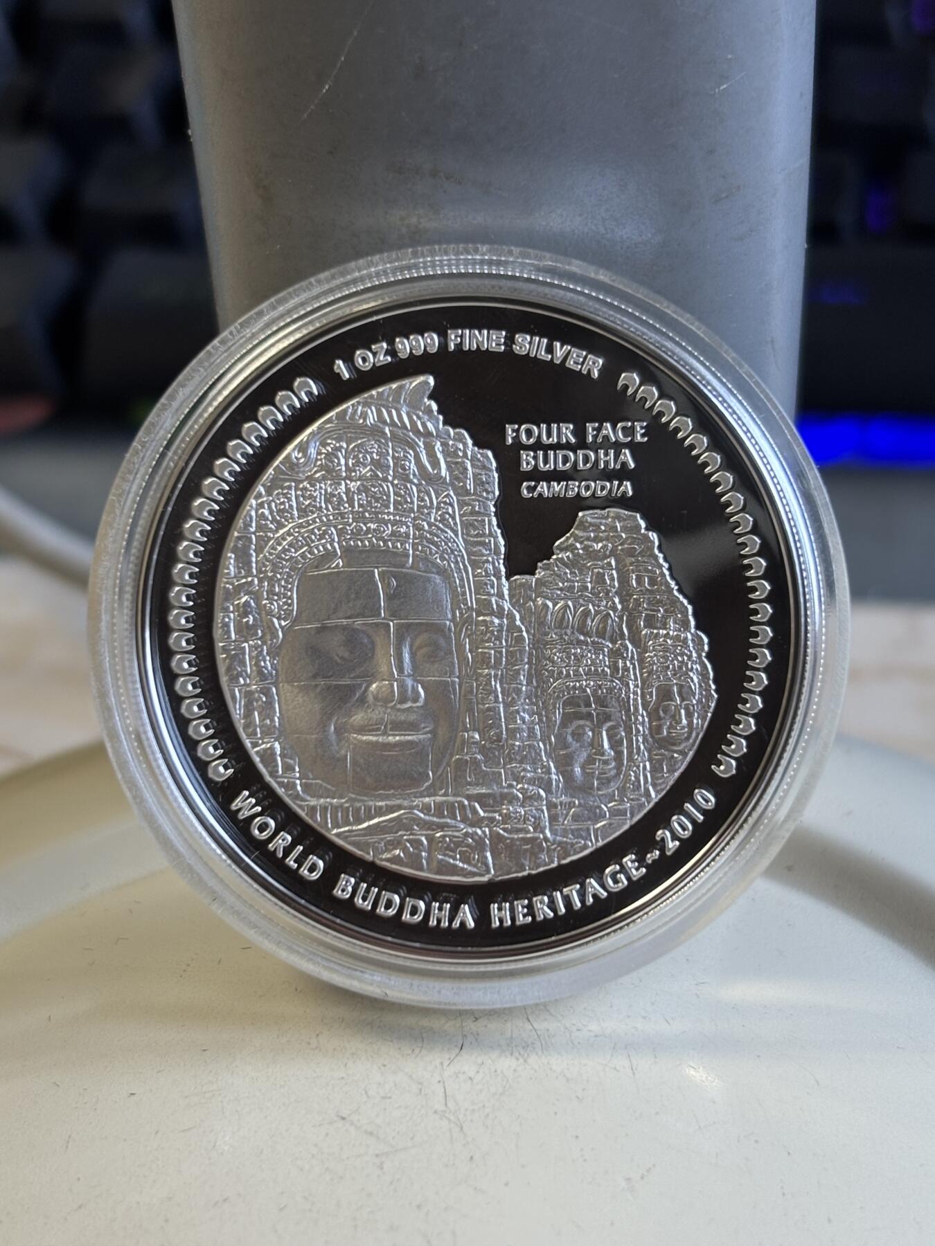 第195期拍卖 不丹2010年世界文化遗产佛精制彩色纪念银币，1盎司999银，发行量10000枚