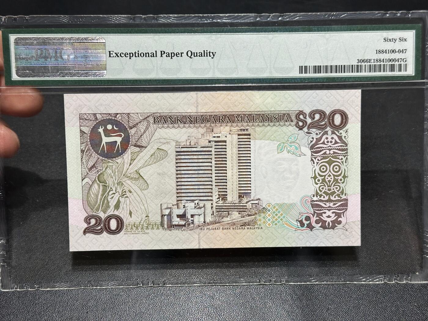 《外钞收藏家》第六百二十一期（精选场）（长期征集拍品、欢迎藏友们联系合作） 1989年马来西亚20林吉特 PMG66