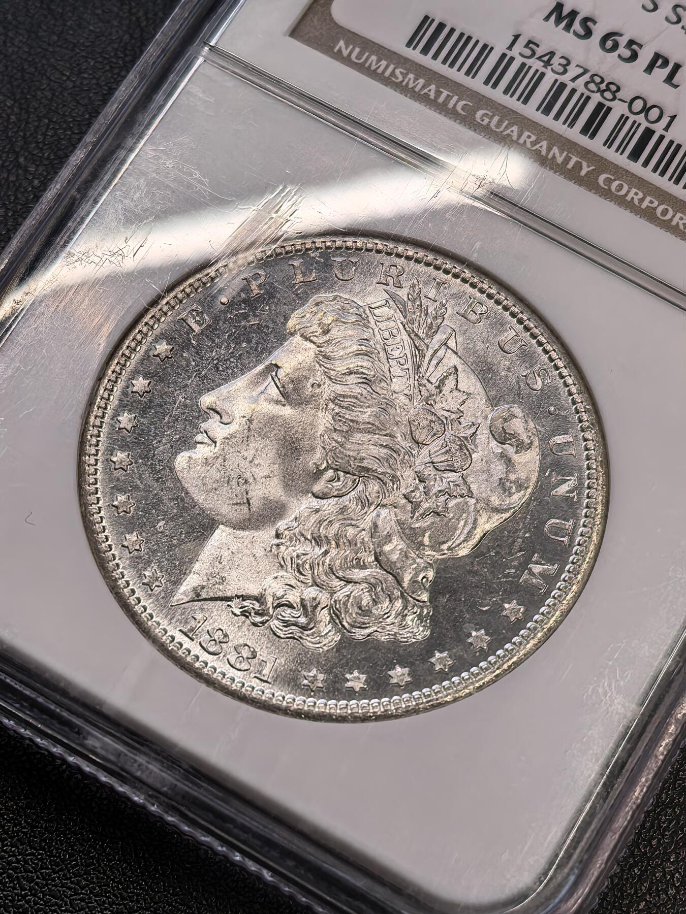 “方寸甄品”甄品场，甄臻铺-世界币章拍卖（第57期，直播拍卖），送拍享返佣金等优惠多多 NGC-MS65PL 美国1881年S版 摩根$1银币 镜面效果很好 币面凝霜 老盒品质保障