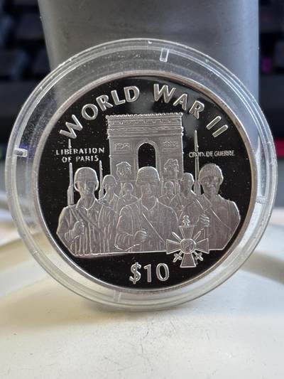 第195期拍卖 - 利比里亚1997年世界第二次大战纪念银币，925银，31克，有氧化点