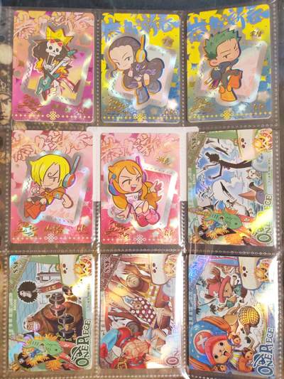 阳大大卡牌拍卖第106期（持续收拍品，周五晚上九点截拍，进群福利早知道） - 海贼王 恭贺新春特卡5张+人物角色卡SSR档4张 粗彩厚卡 带卡页卡膜
