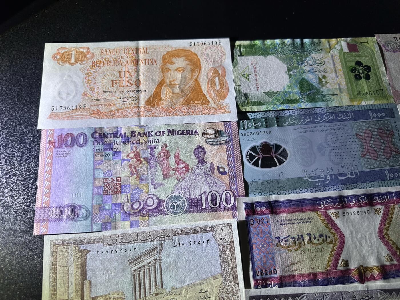 《外钞收藏家》第六百二十一期（精选场）（长期征集拍品、欢迎藏友们联系合作） 阿根廷1比索AU+尼日利亚、毛里塔尼亚、黎巴嫩等14张全新 一起
