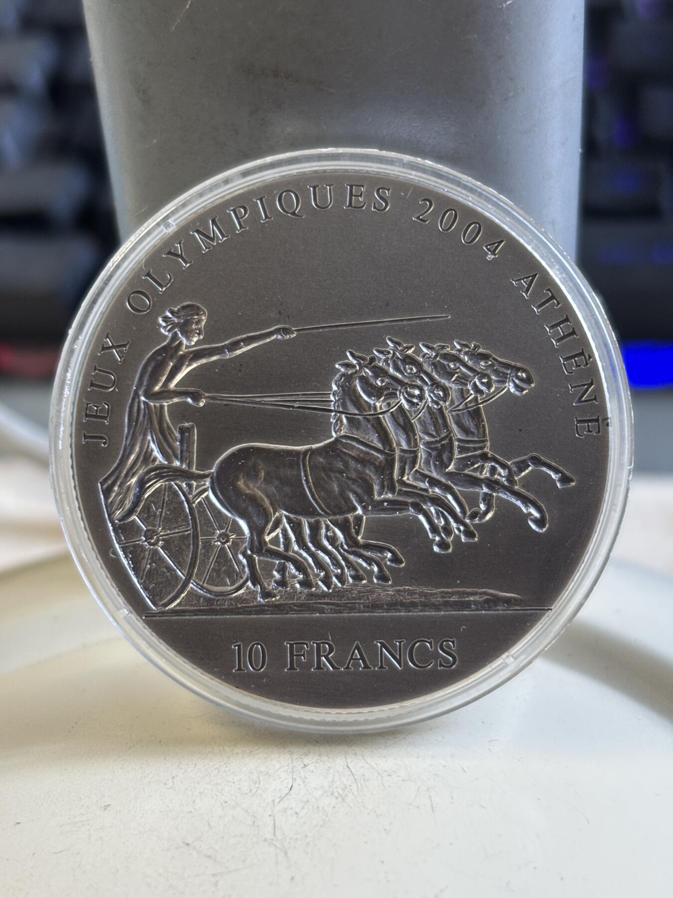 第195期拍卖 刚果加纳2001年古代太阳神马车凹凸银币两枚，999银，31.1克*2，发行15000套