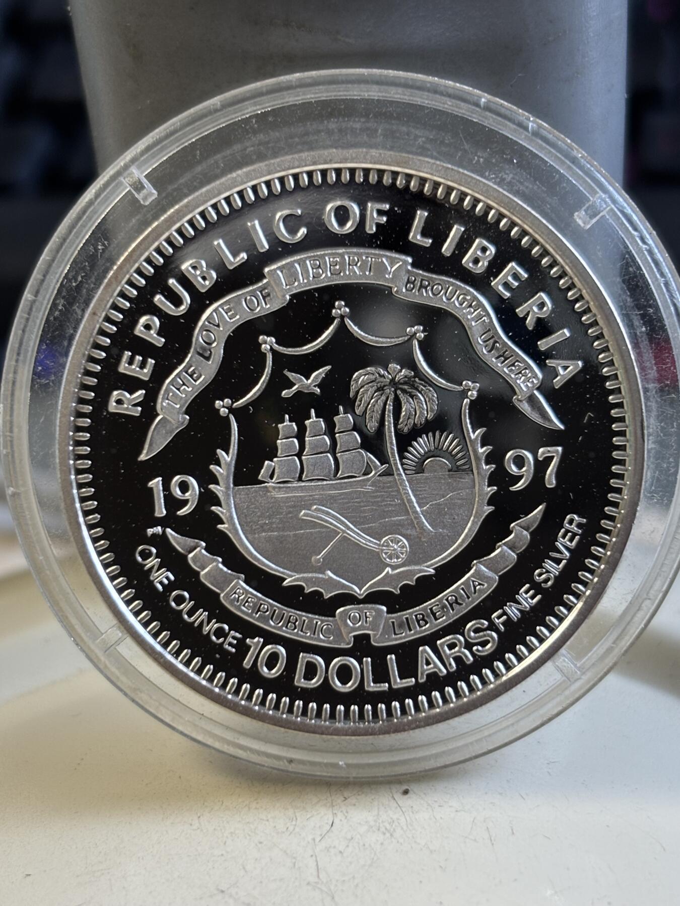第195期拍卖 利比里亚1997年世界第二次大战纪念银币，925银，31克，有氧化点