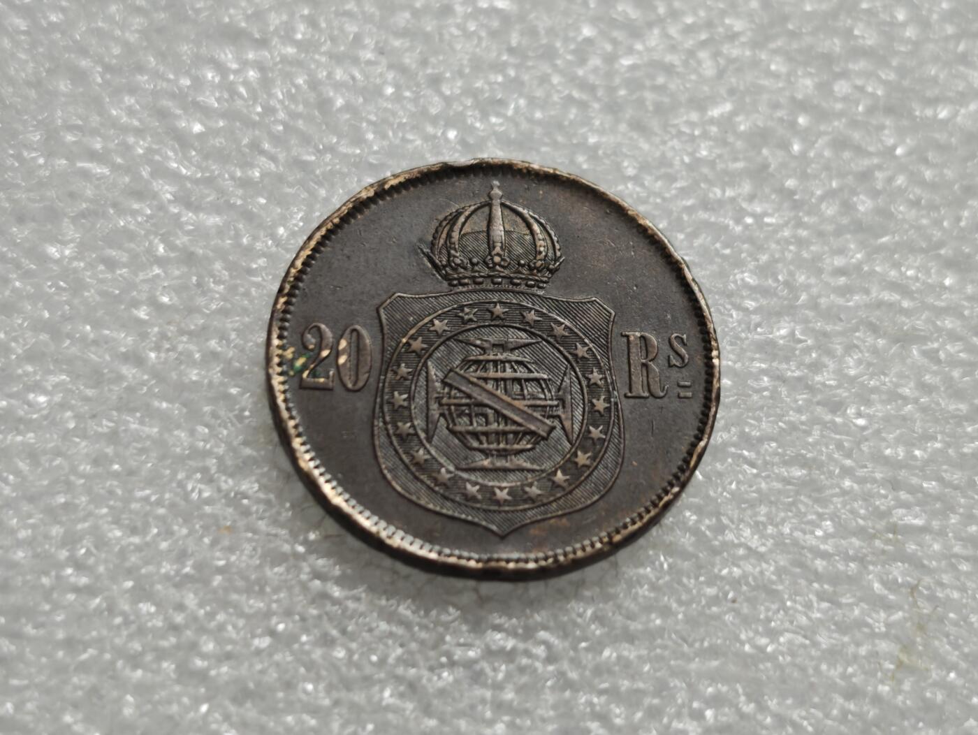 瓶子🏺第234期拍卖会  巴西帝国佩德罗二世20瑞斯铜币（1870年）   巴西帝国时期（1822–1889）佩德罗二世（Pedro II）统治下发行的20 Reis（瑞斯）铜币，铸造年份为1870年 拉丁文 PETRUS II D. G. C. IMP. ET PERP. BRAS. DEF.，意为“佩德罗二世，蒙神之恩，巴西皇帝及永久捍卫者” 