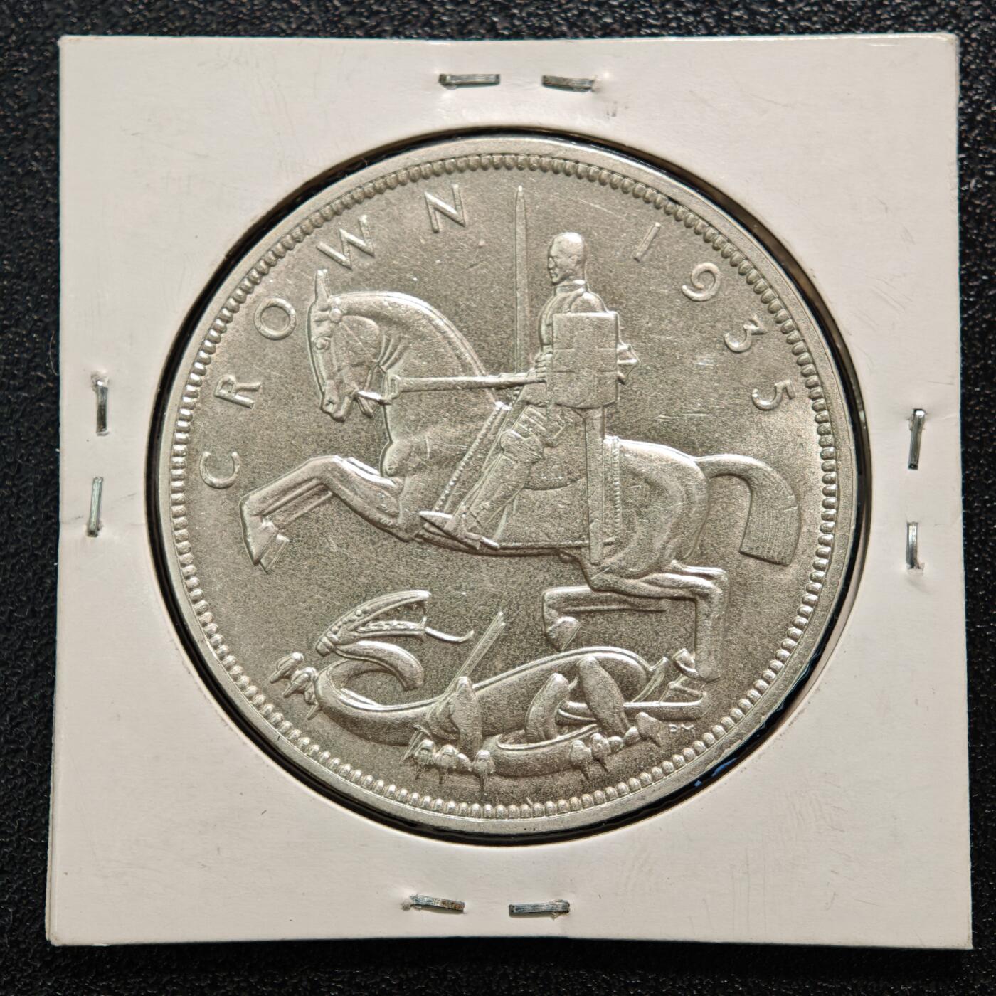 【德藏】世界币章拍卖第169期（拍品征集中~欢迎藏友联系） 老藏家集藏系列之- 1935年 英国乔治五世1克朗银币 直径约：39mm；重约：28.3g 入册20余年·附有当年购入价