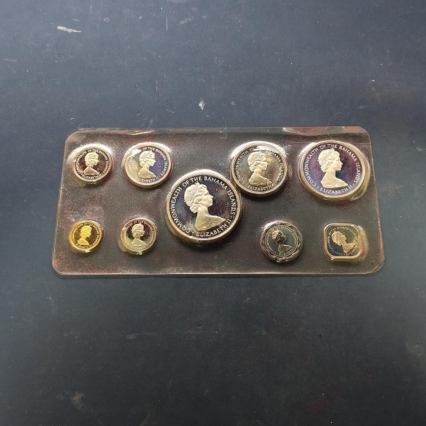 【全场包邮】纯粹捡漏拍515场 【少见】巴哈马群岛1973年官方封装精制套币（封装有破损）-量9853-含国徽银币【45毫米42.12克92.5%】+火烈鸟银币【40毫米29.8克92.5%】+海螺银币【34毫米18.14克80%】+旗鱼银币【29毫米10.37克80%】【共计含纯银89.33克】