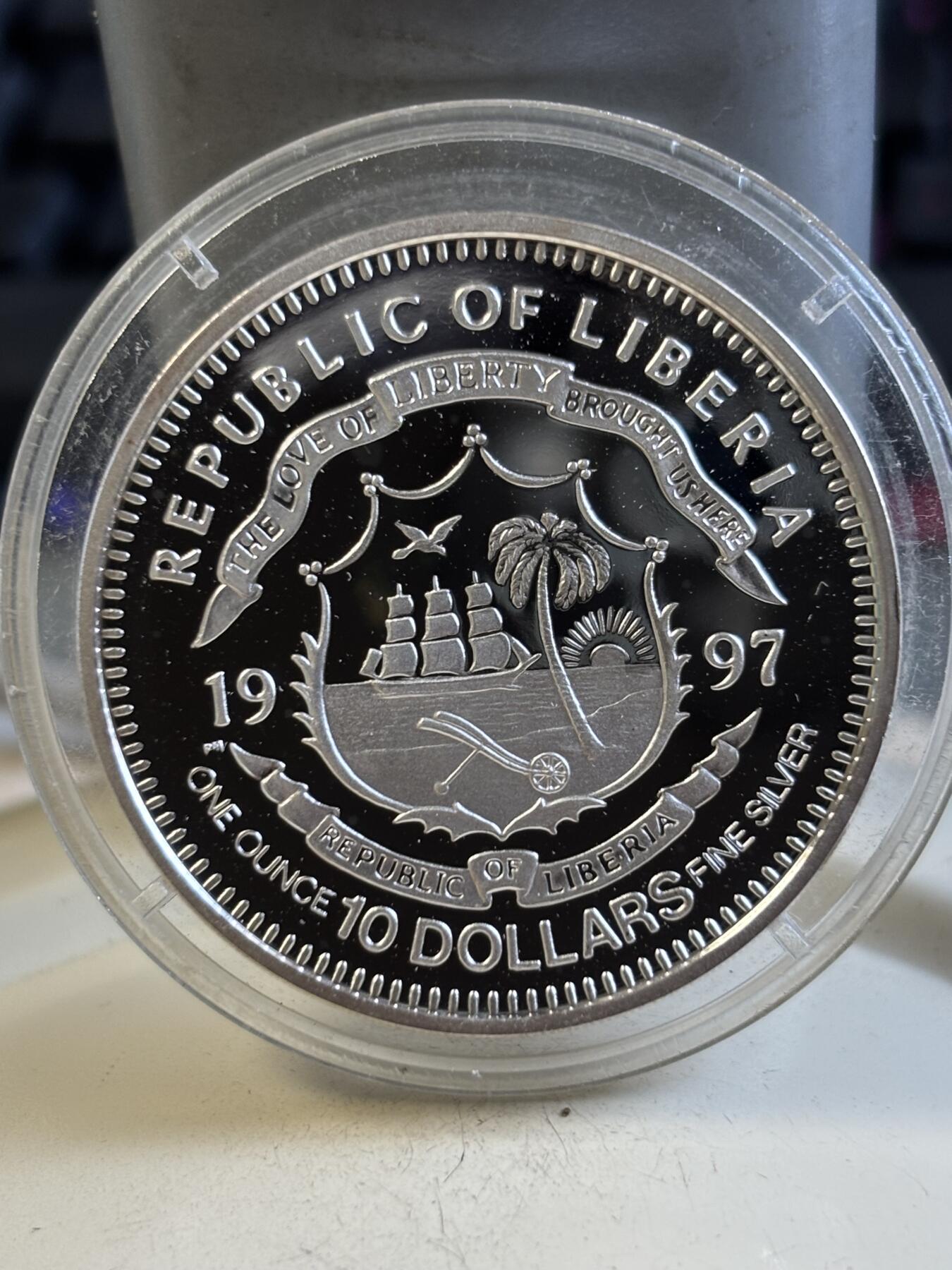 第195期拍卖 利比里亚1997年世界第二次大战纪念银币，925银，31克，有氧化点