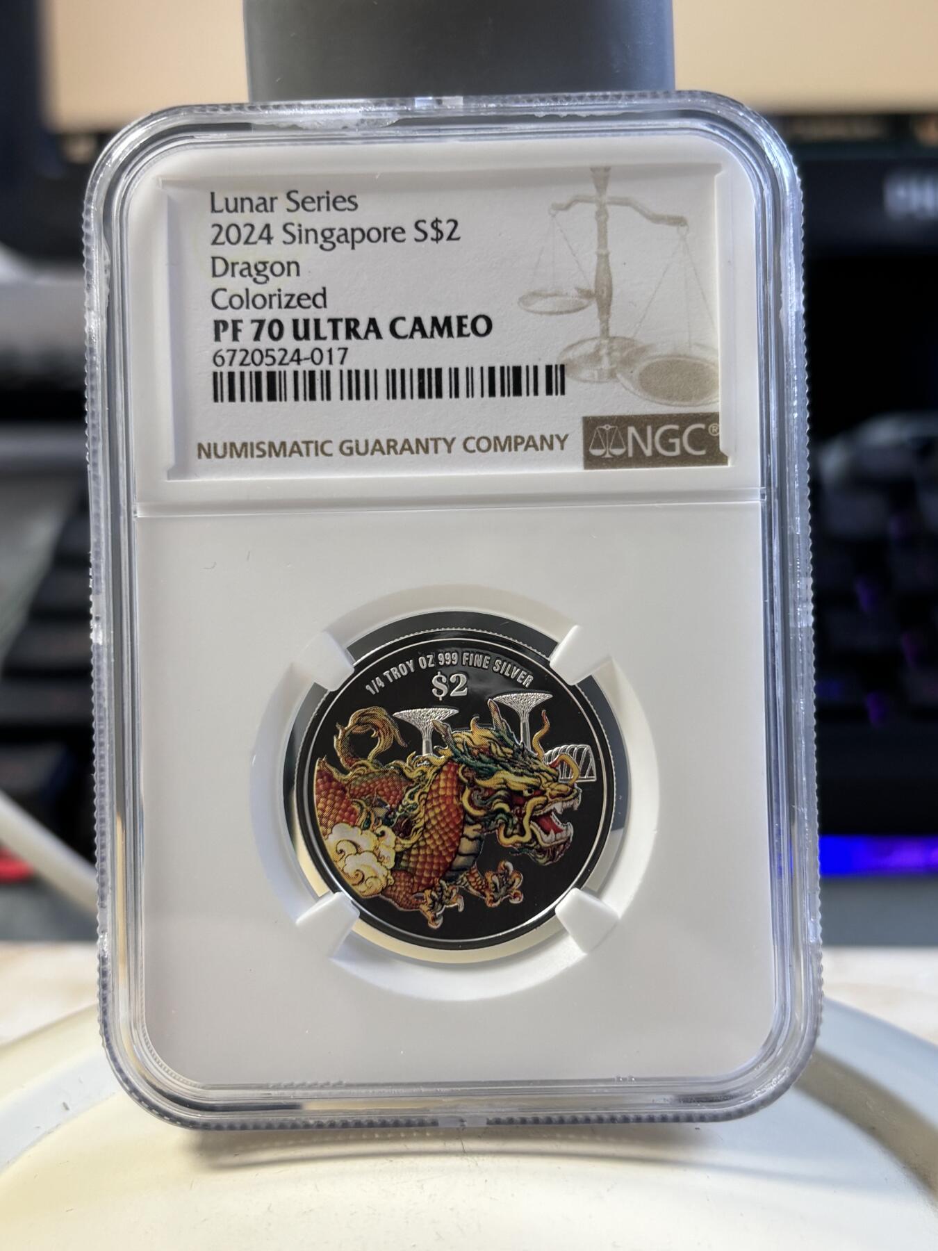 第194期拍卖 新加坡2024年十二生肖龙年银币3枚套NGC-PF70，1盎司/1盎司/1/4盎司，999银，发行2000套，无盒证