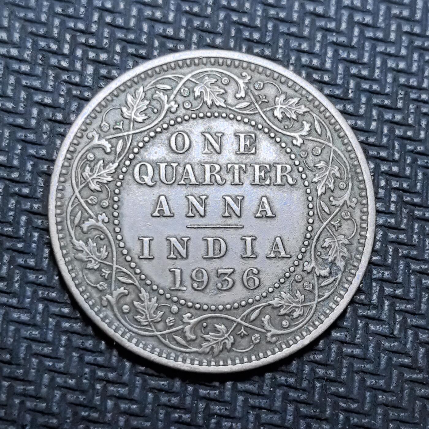 外国优质老铜币银币苏联纪念章，每周六晚九点倒数截拍，满百包邮可寄存，持续收拍 英属印度乔治五世1936年1/4 安娜铜币，正面英王肖像威严霸气，背面纹饰精细精美；材质珍稀稀有，包浆温润自然，是近代英属印度殖民钱币文化的精品代表，收藏与史料价值兼备。